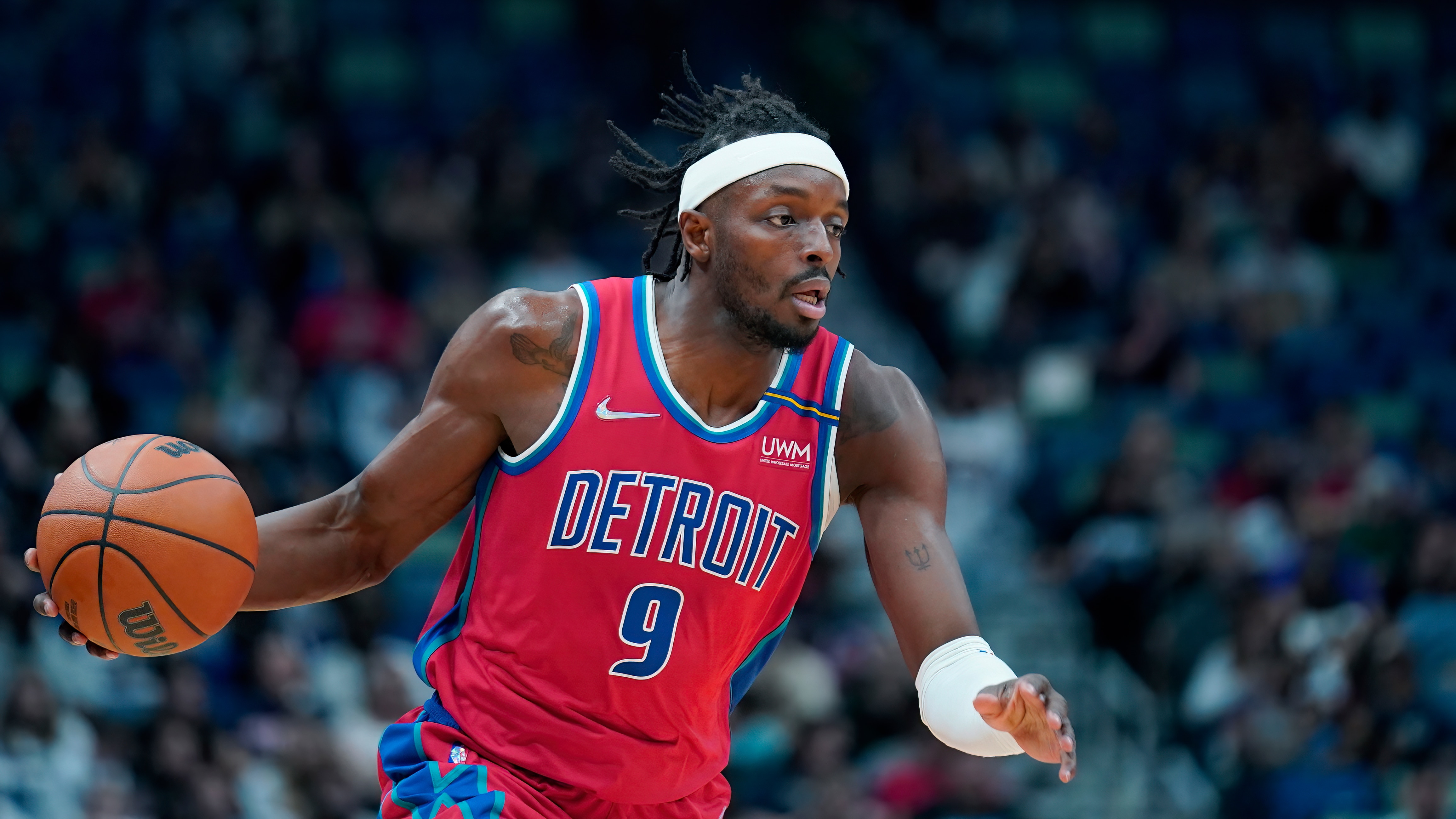 Detroit Pistons forward Jerami Grant (9) moves the ball up court in the first half of an NBA basketball game against the New Orleans Pelicans in New Orleans, Friday, Dec. 10, 2021. (AP Photo/Gerald Herbert) Detroit Pistons forward Jerami Grant (9) moves the ball up court in the first half of an NBA basketball game against the New Orleans Pelicans in New Orleans, Friday, Dec. 10, 2021. (AP Photo/Gerald Herbert)