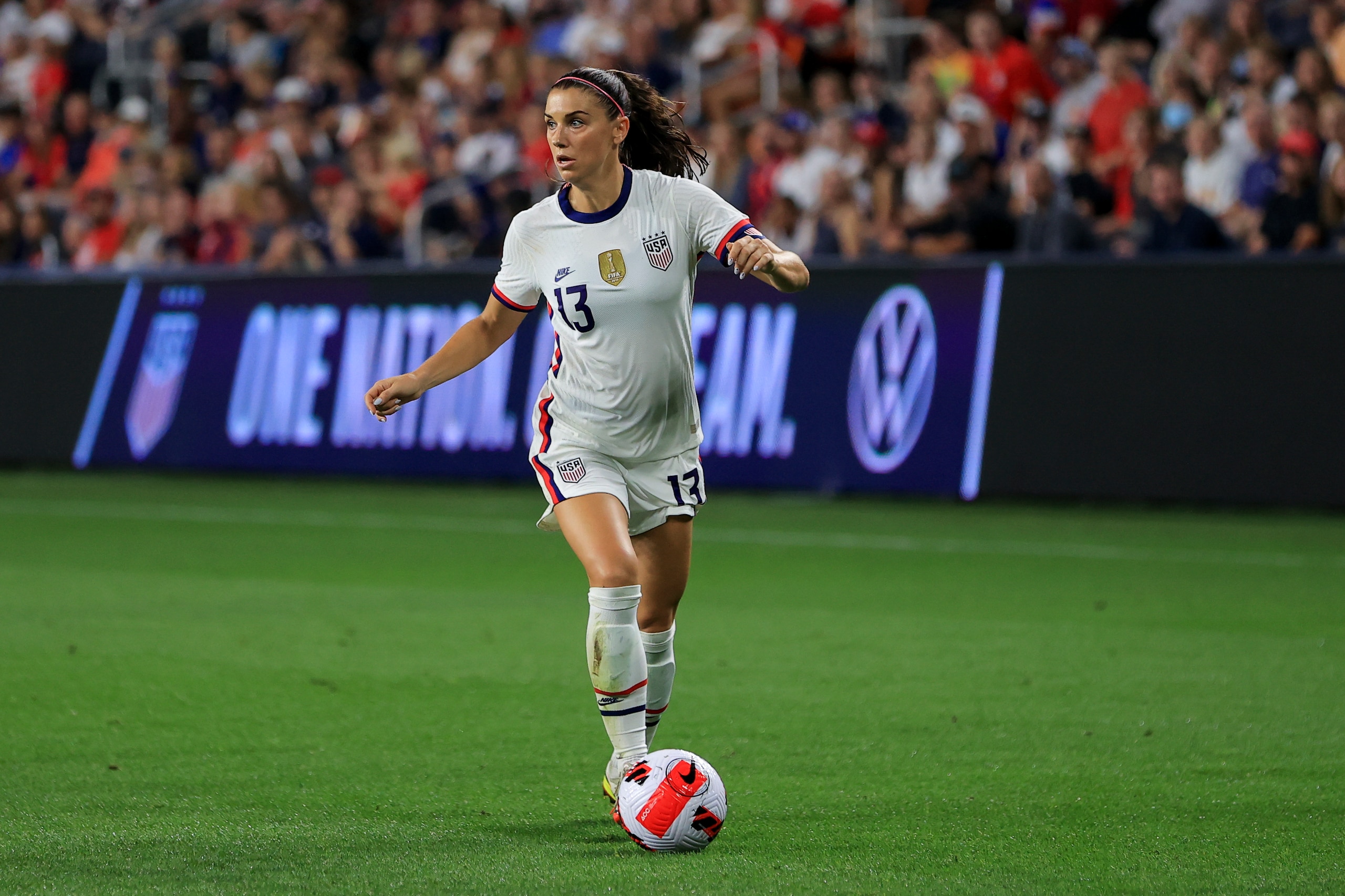 United States forward Alex Morgan (13) plays the field during an international friendly soccer match against Paraguay, Tuesday, Sept. 21, 2021, in Cincinnati. The United States won 8-0. (AP Photo/Aaron Doster) United States forward Alex Morgan (13) plays the field during an international friendly soccer match against Paraguay, Tuesday, Sept. 21, 2021, in Cincinnati. The United States won 8-0. (AP Photo/Aaron Doster)