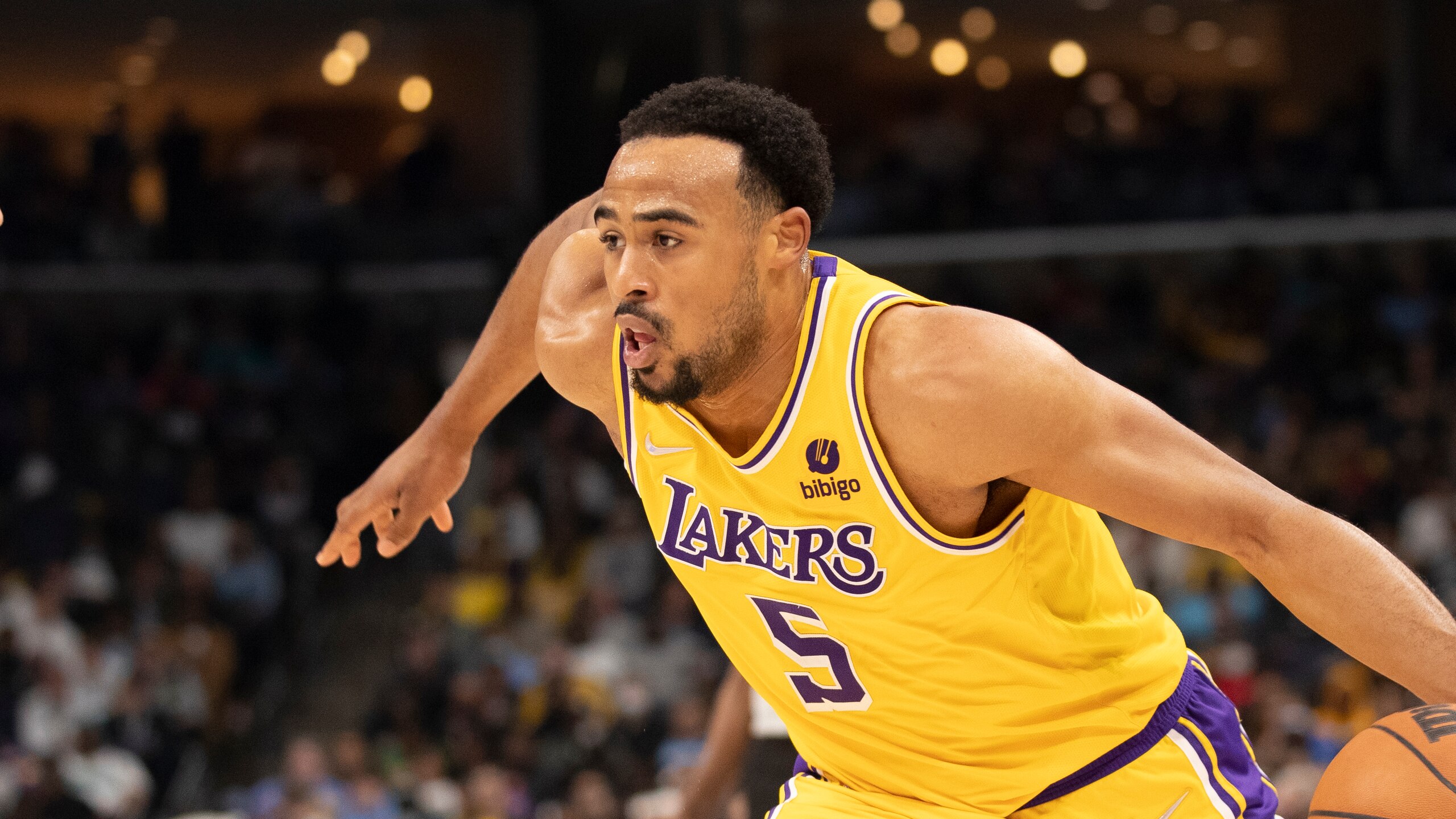 Los Angeles Lakers guard Talen Horton-Tucker plays against the Memphis Grizzlies in an NBA basketball game Thursday, Dec. 9, 2021, in Memphis, Tenn. (AP Photo/Nikki Boertman)