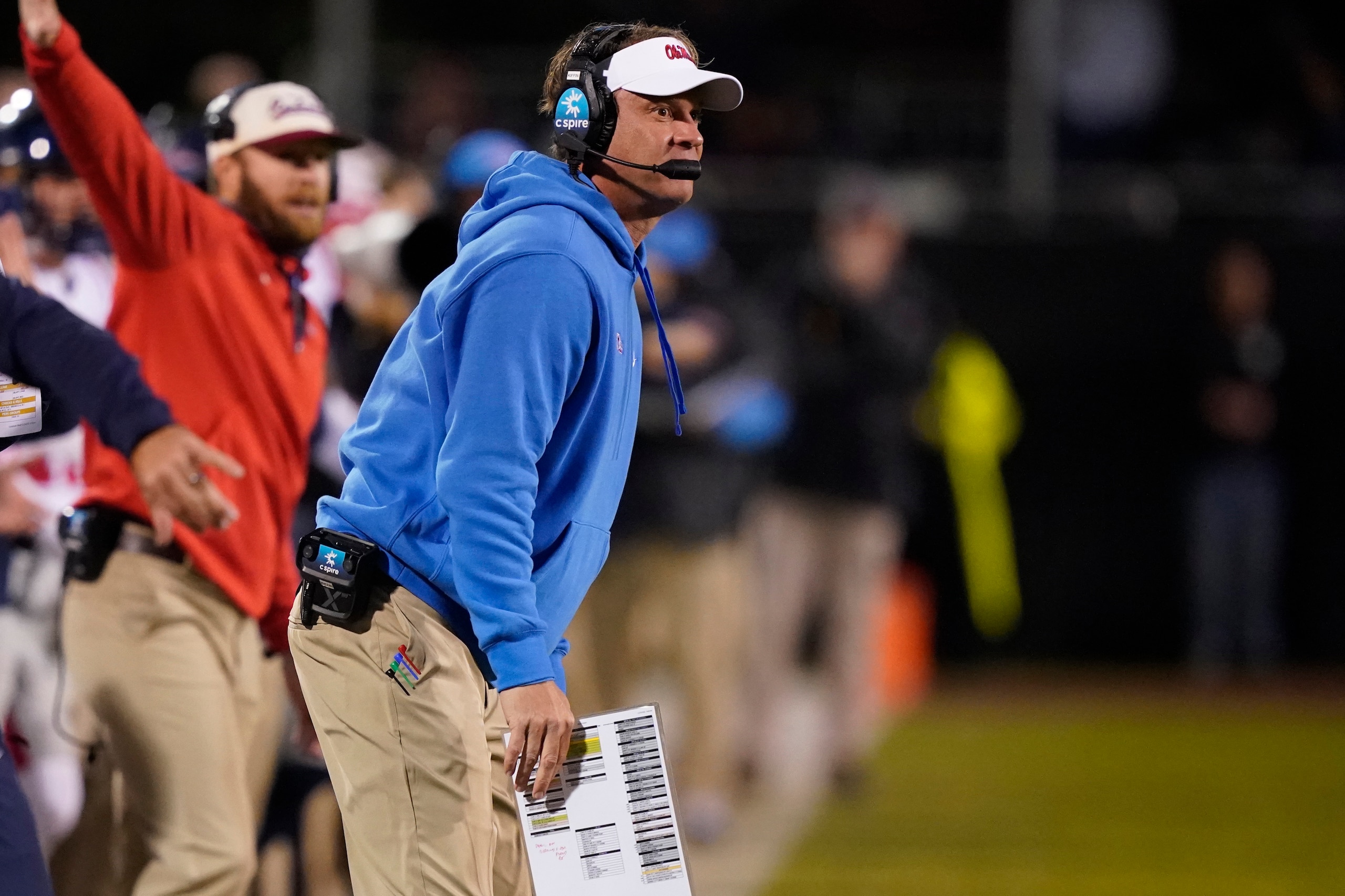 Mississippi coach Lane Kiffin calls out to players during the second half of the team's NCAA college football game against Mississippi State, Thursday, Nov. 25, 2021, in Starkville, Miss. Mississippi won 31-21. (AP Photo/Rogelio V. Solis)