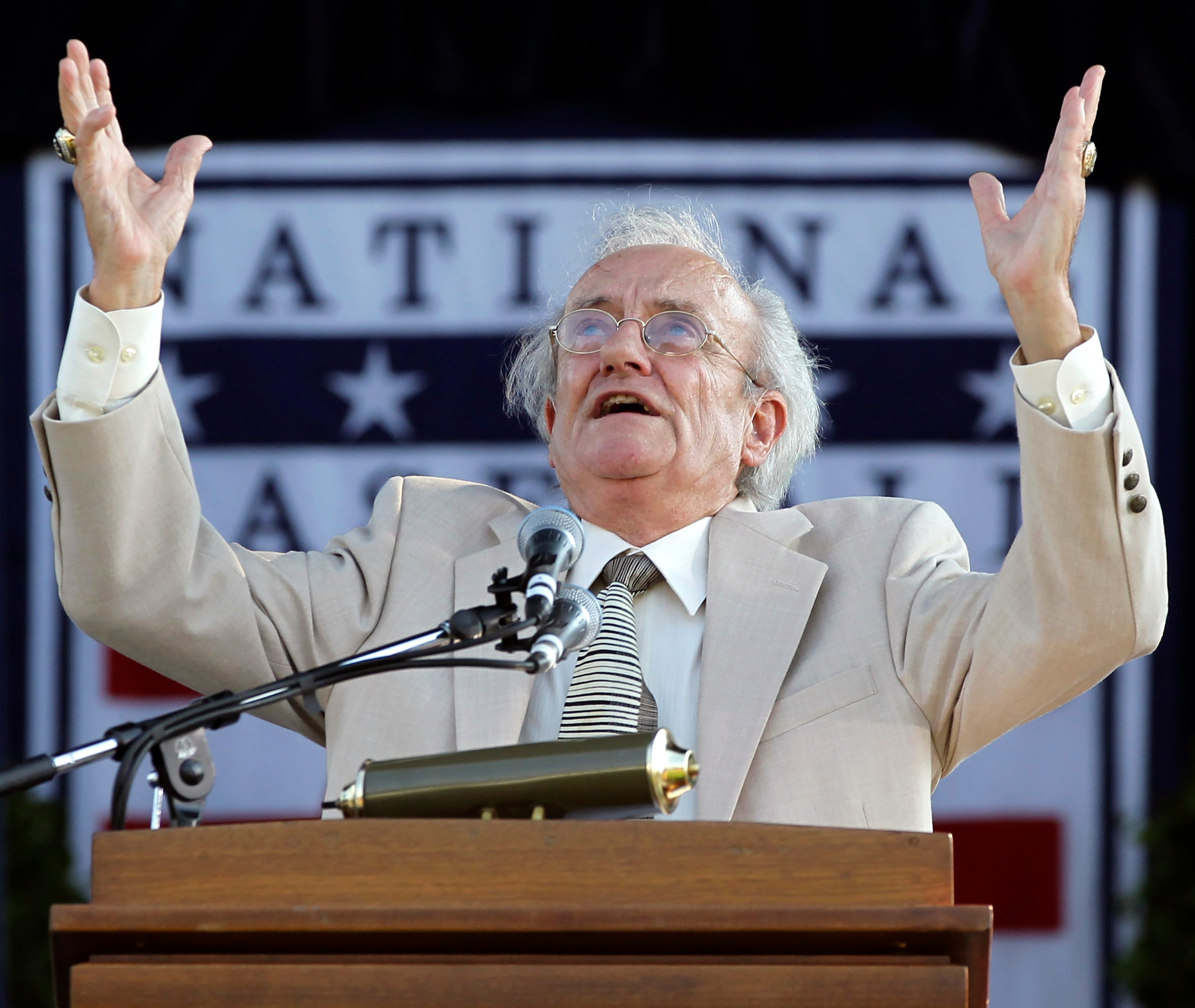 FILE - Roland Hemond speaks after receiving the Buck O'Neil Lifetime Achievement Award during a Baseball Hall of Fame ceremony at Doubleday Field in Cooperstown, N.Y.,  July 23, 2011. Hemond, whose 70-year career in baseball included three Executive of the Year awards as general manager of the Chicago White Sox and Baltimore Orioles, has died. He was 92. The Arizona Diamondbacks announced Hemond’s death Monday, Dec. 13, 2021. (AP Photo/Mike Groll, File)