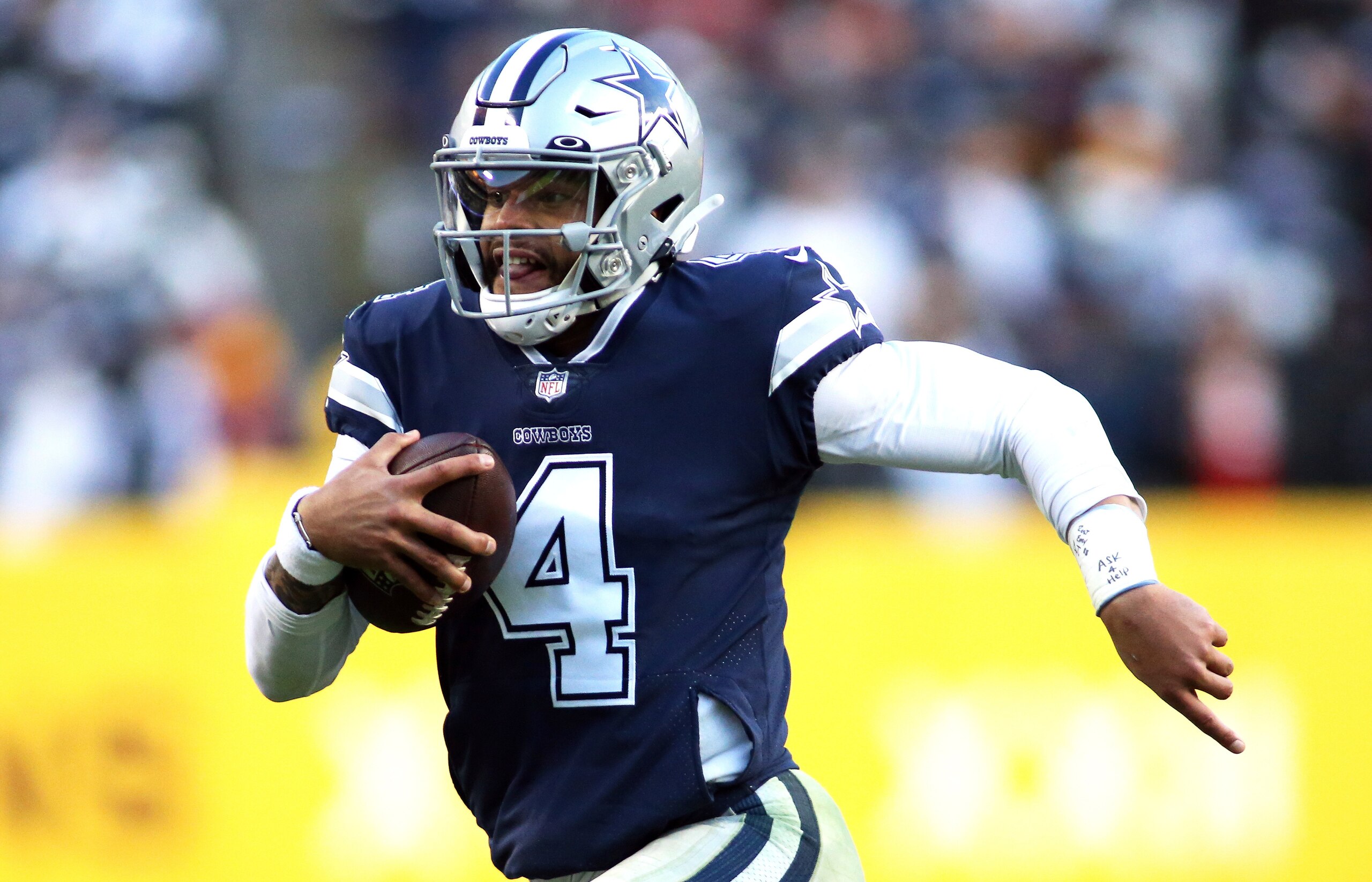 Dallas Cowboys quarterback Dak Prescott (4) runs during an NFL football game against the Washington Football Team, Sunday, Dec. 12, 2021 in Landover. (AP Photo/Daniel Kucin Jr.)