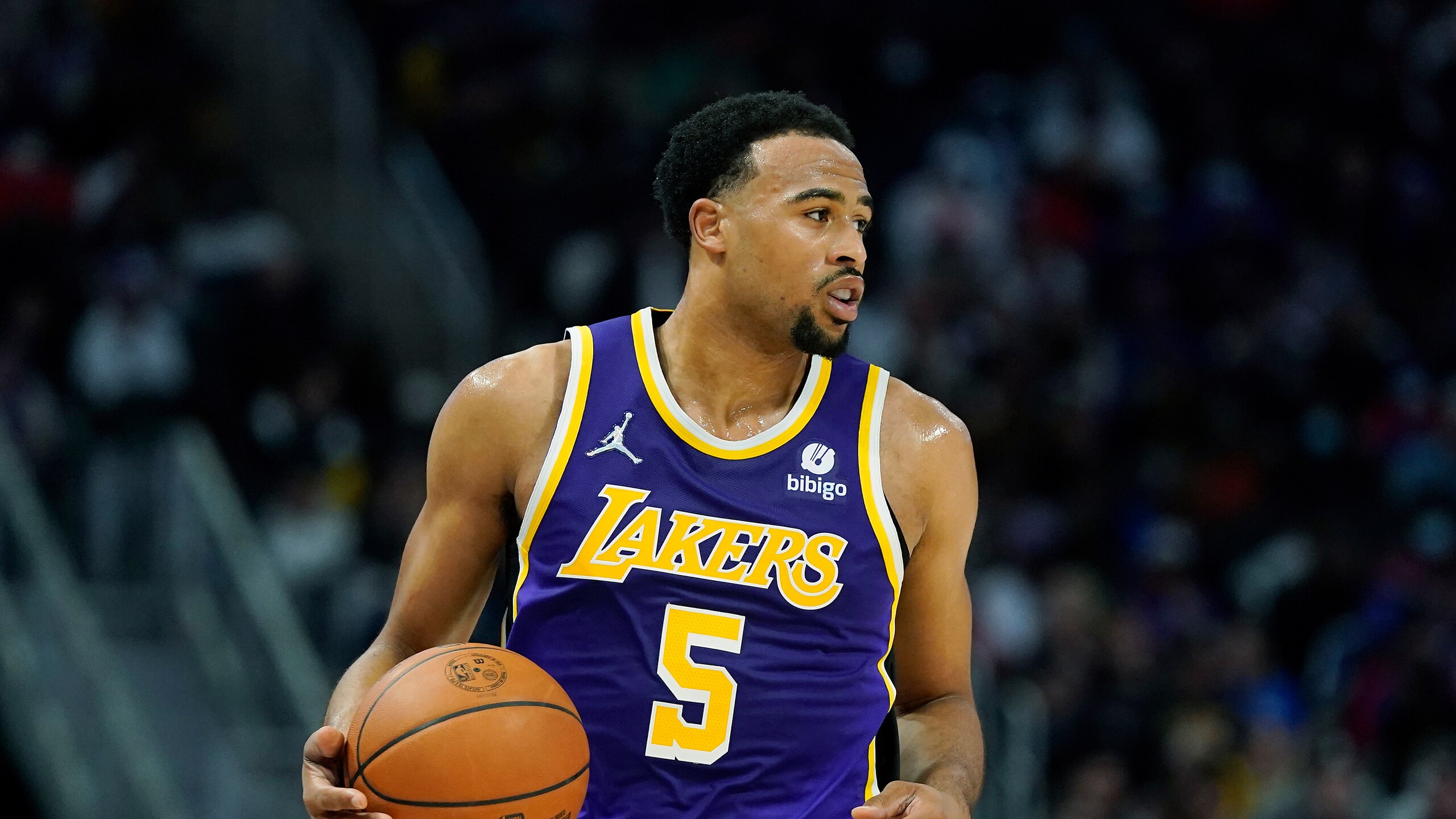Los Angeles Lakers guard Talen Horton-Tucker plays during the first half of an NBA basketball game, Sunday, Nov. 21, 2021, in Detroit. (AP Photo/Carlos Osorio)