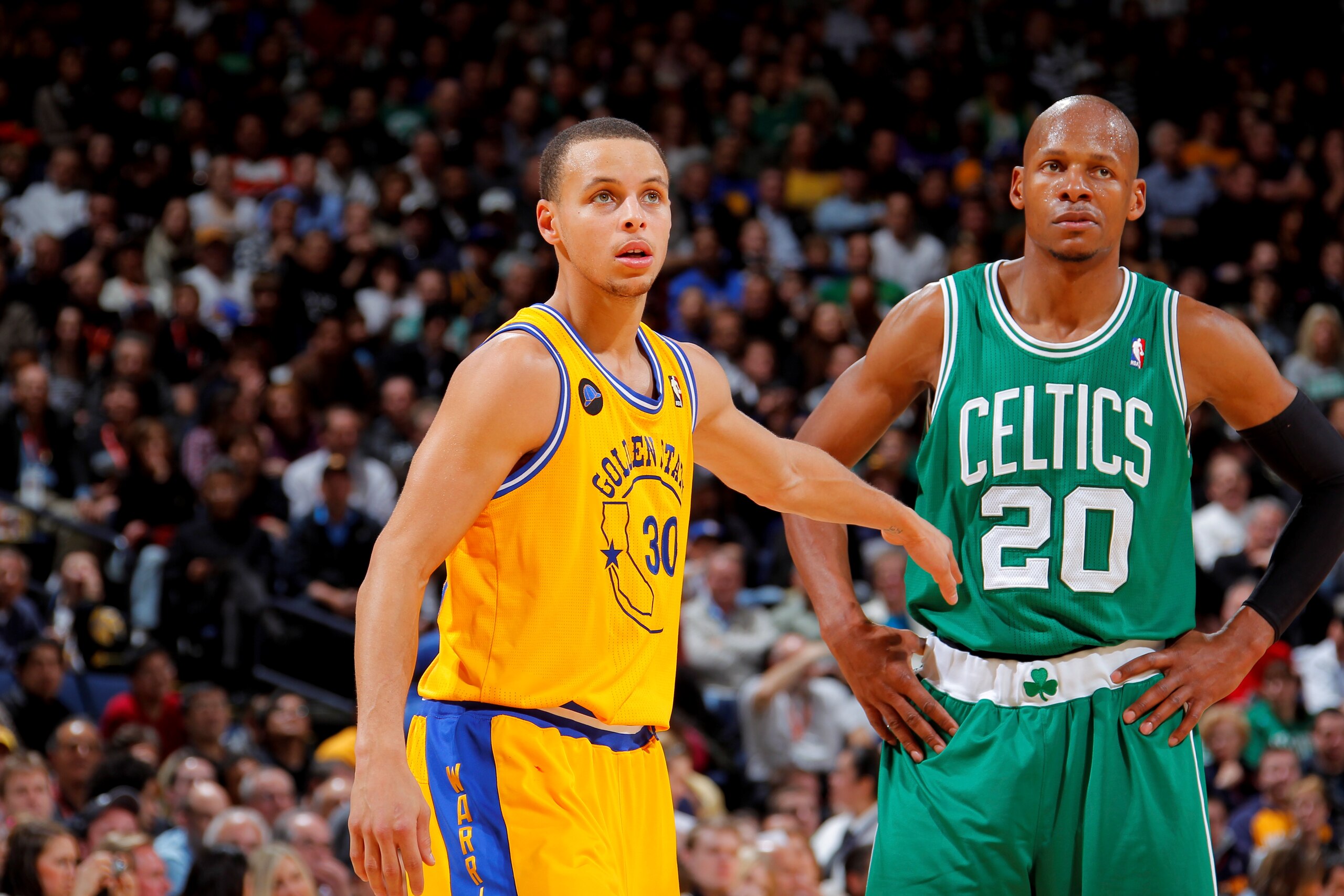 OAKLAND, CA - FEBRUARY 22: Stephen Curry #30 of the Golden State Warriors and Ray Allen #20 of the Boston Celtics stand on the court during the game on February 22, 2011 at Oracle Arena in Oakland, California. NOTE TO USER: User expressly acknowledges and agrees that, by downloading and/or using this Photograph, user is consenting to the terms and conditions of the Getty Images License Agreement. Mandatory Copyright Notice: Copyright 2011 NBAE (Photo by Rocky Widner/NBAE via Getty Images) OAKLAND, CA - FEBRUARY 22: Stephen Curry #30 of the Golden State Warriors and Ray Allen #20 of the Boston Celtics stand on the court during the game on February 22, 2011 at Oracle Arena in Oakland, California. NOTE TO USER: User expressly acknowledges and agrees that, by downloading and/or using this Photograph, user is consenting to the terms and conditions of the Getty Images License Agreement. Mandatory Copyright Notice: Copyright 2011 NBAE (Photo by Rocky Widner/NBAE via Getty Images)