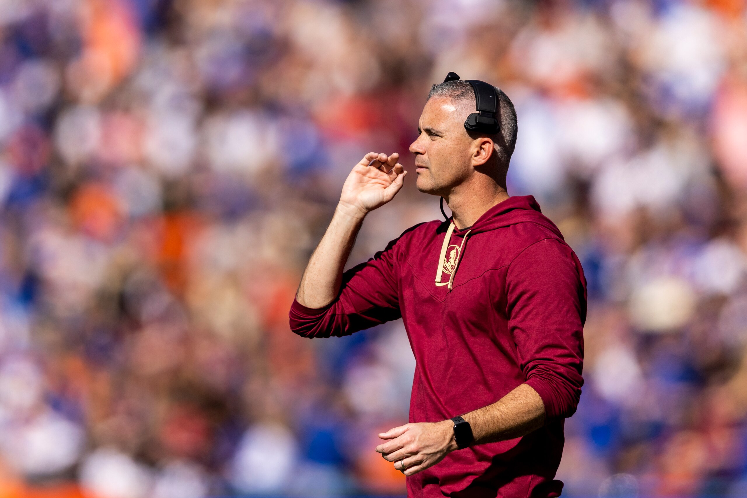 GAINESVILLE, FLORIDA - NOVEMBER 27: head coach Mike Norvell of the Florida State Seminoles looks on during the second quarter of a game against the Florida Gators at Ben Hill Griffin Stadium on November 27, 2021 in Gainesville, Florida. (Photo by James Gilbert/Getty Images)