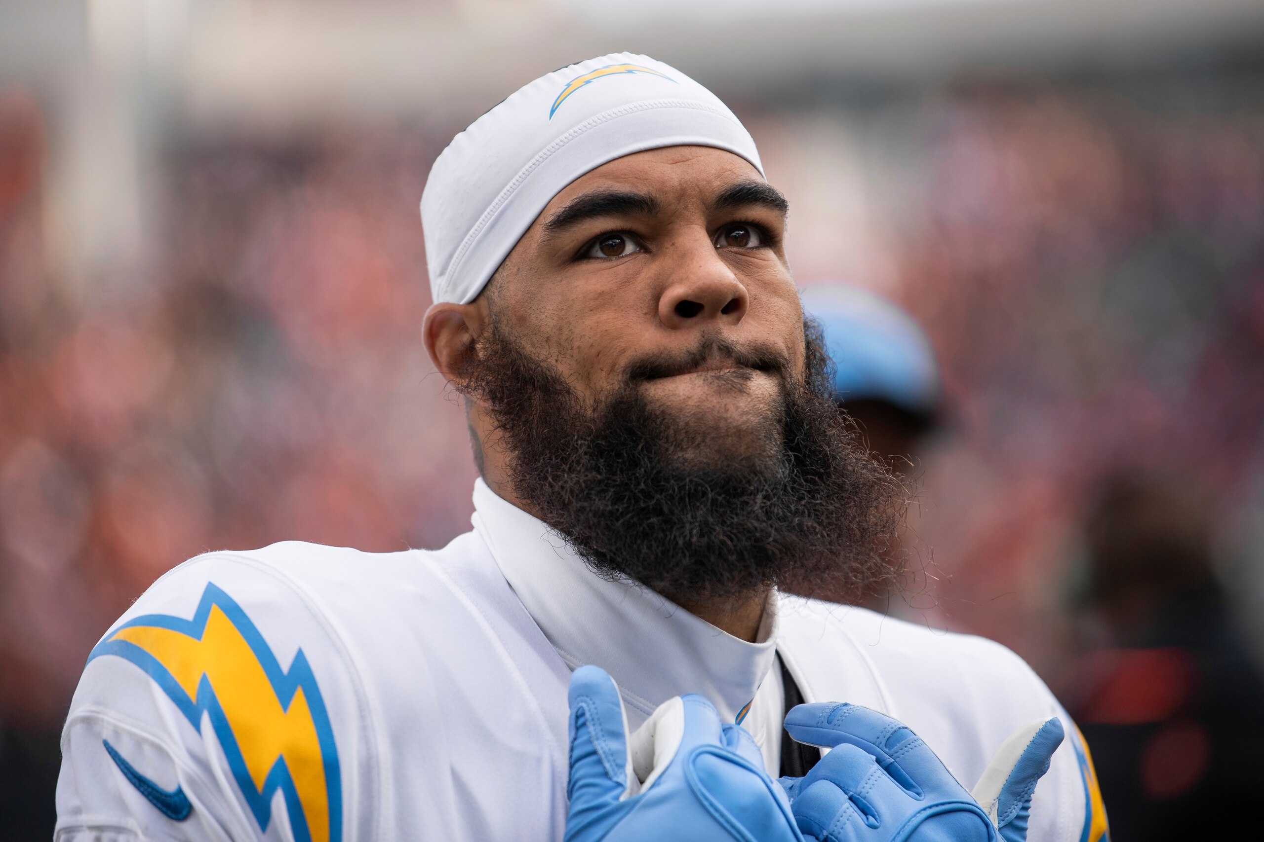 Los Angeles Chargers wide receiver Keenan Allen (13) walks off the field during an NFL football game against the Cincinnati Bengals, Sunday, Dec. 5, 2021, in Cincinnati. (AP Photo/Zach Bolinger)