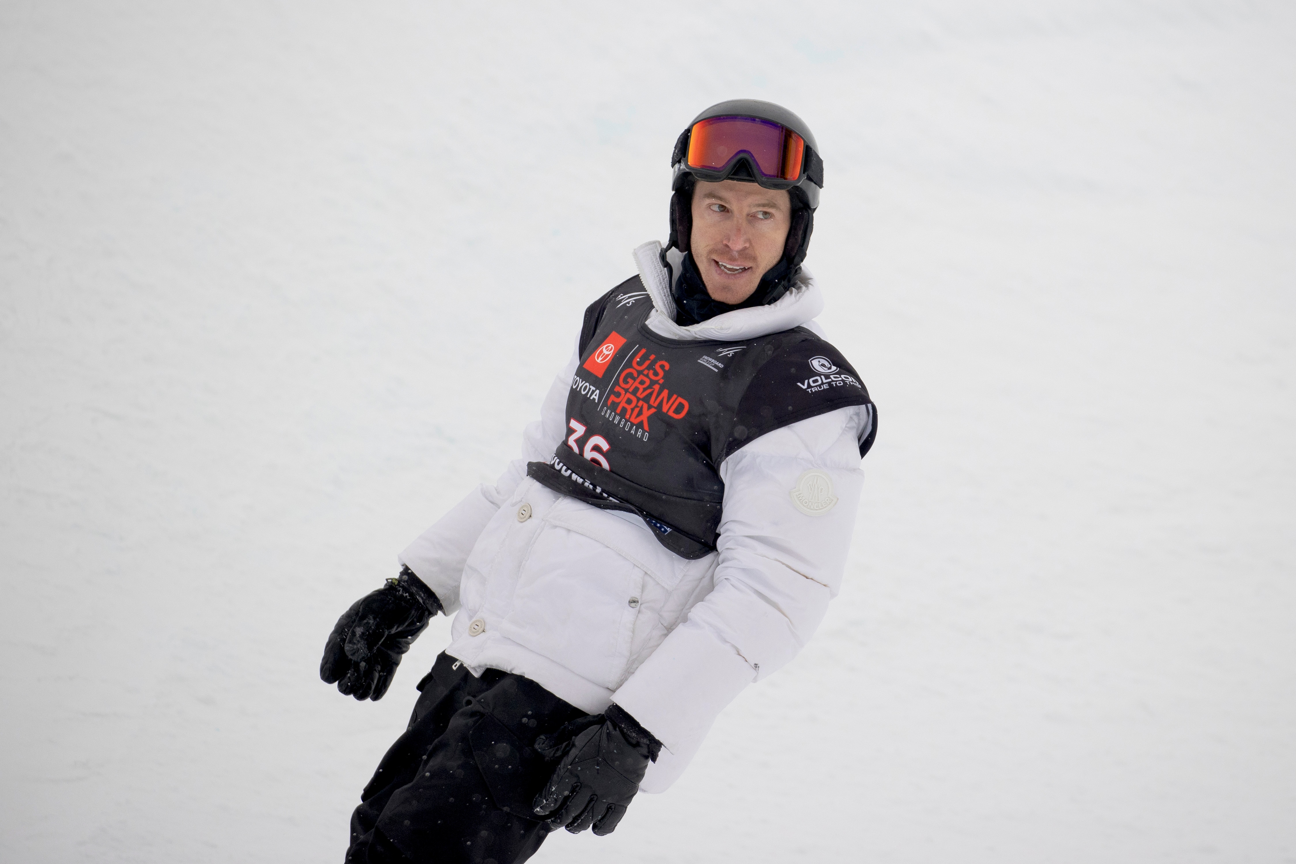 Shaun White, of United States, reacts following a qualifying run on the halfpipe Thursday, Dec. 9, 2021, at the U.S. Grand Prix snowboarding event at Copper Mountain, Colo. (AP Photo/Hugh Carey)