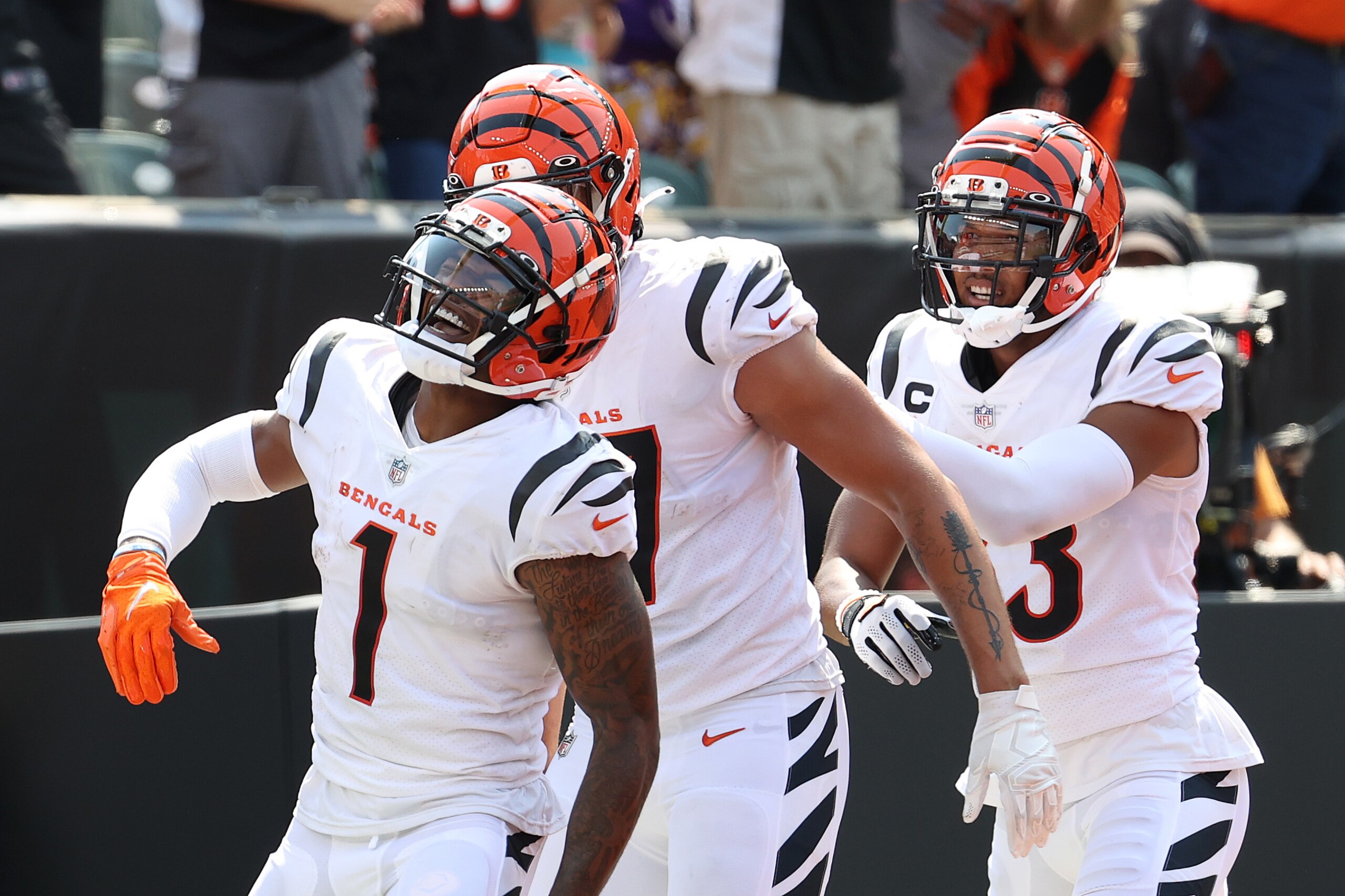 CINCINNATI, OHIO - SEPTEMBER 12: Ja'Marr Chase #1 of the Cincinnati Bengals celebrates after a 50-yard touchdown reception from Joe Burrow #9 during the second quarter against the Minnesota Vikings at Paul Brown Stadium on September 12, 2021 in Cincinnati, Ohio. (Photo by Andy Lyons/Getty Images)