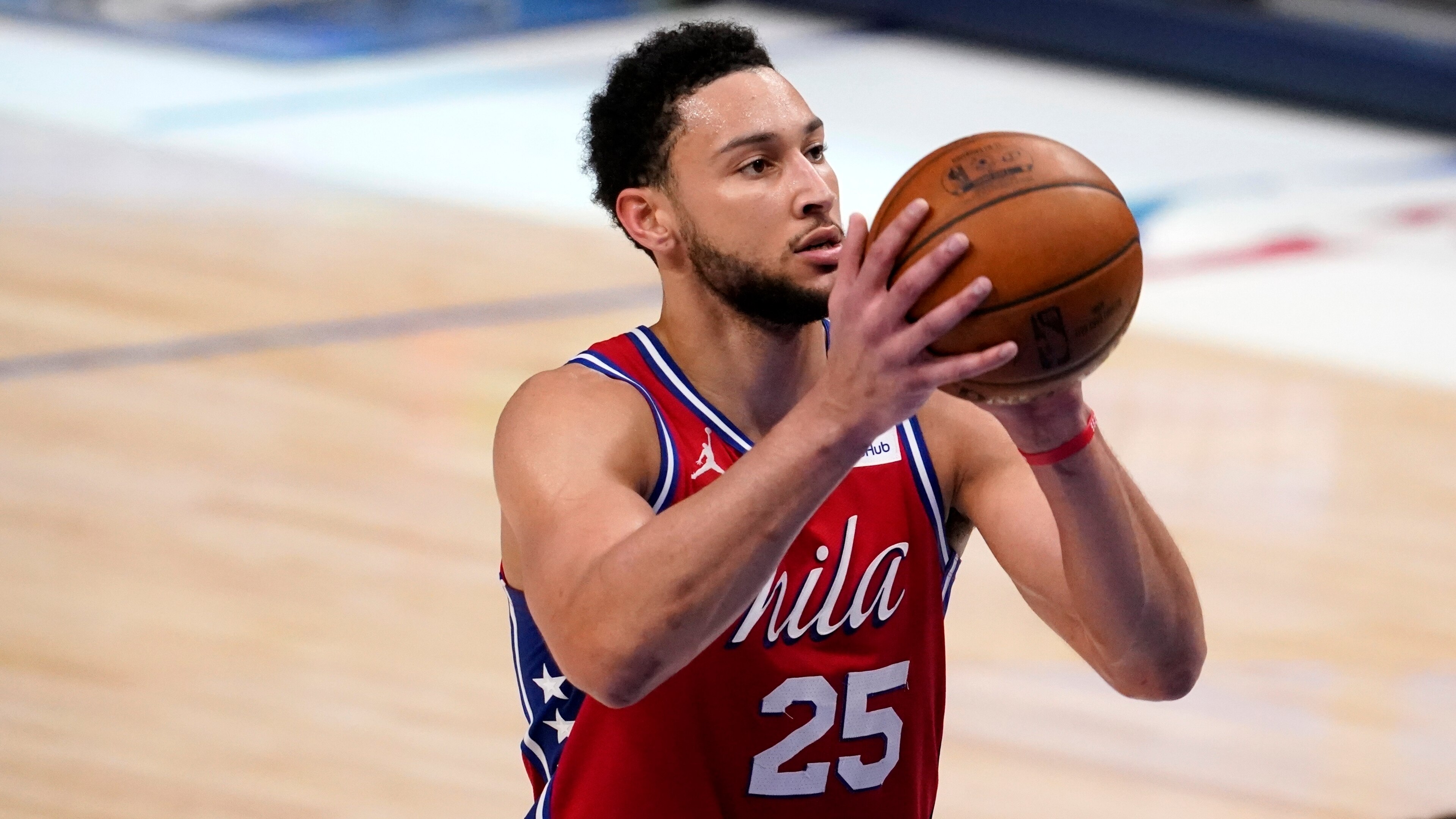 FILE - Philadelphia 76ers' Ben Simmons shoots free throws during an NBA basketball game against the Dallas Mavericks in Dallas, in this Monday, April 12, 2021, file photo. Ben Simmons can't shoot and lost his confidence. He blamed a mental block on the worst free-throw shooting percentage in NBA playoff history. The 76ers head into the offseason faced with a big question - do they try and salvage Simmons or deal the former No. 1 pick. . (AP Photo/Tony Gutierrez)