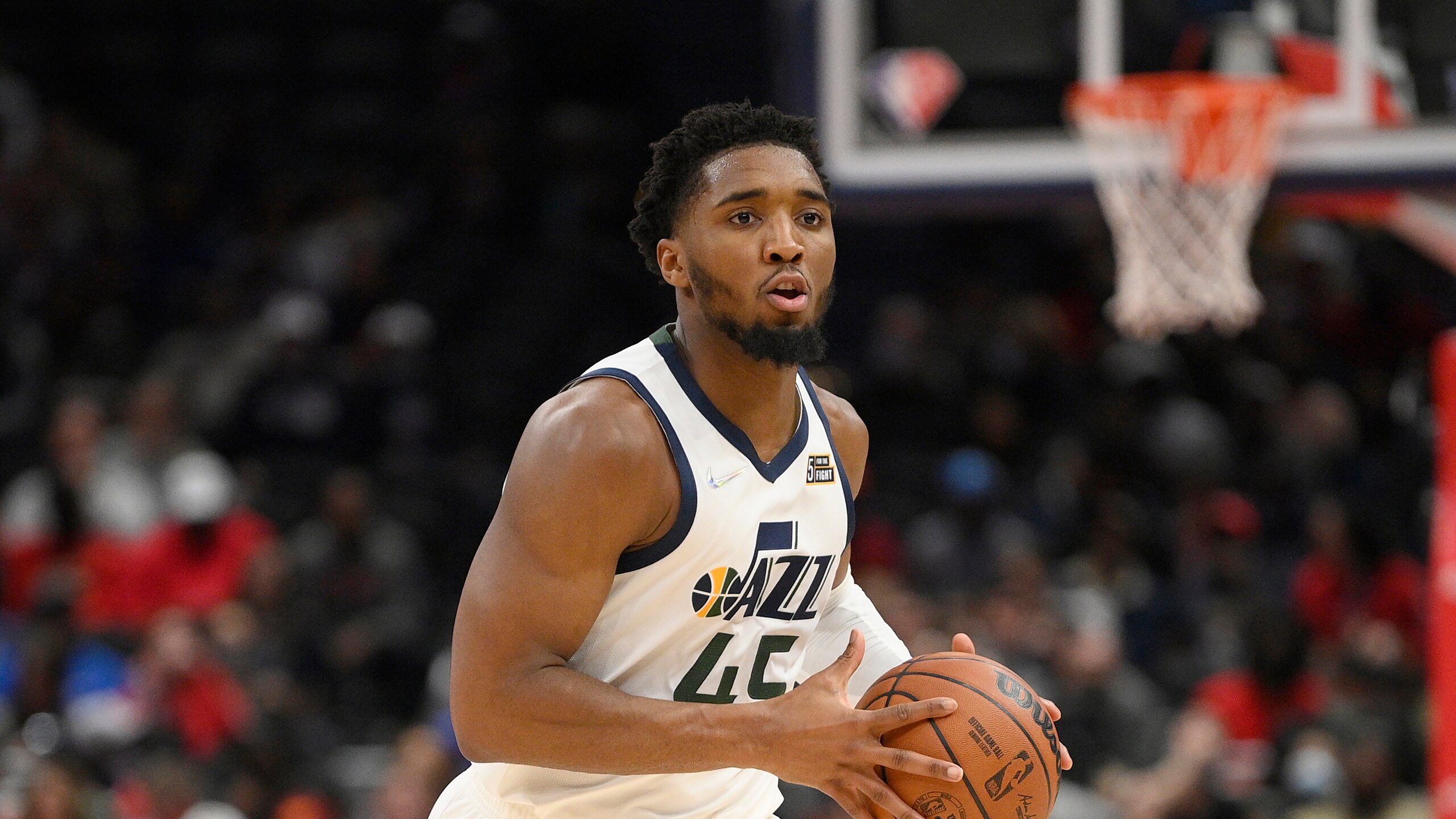 Utah Jazz guard Donovan Mitchell (45) in action during the first half of an NBA basketball game against the Washington Wizards, Saturday, Dec. 11, 2021, in Washington. (AP Photo/Nick Wass)