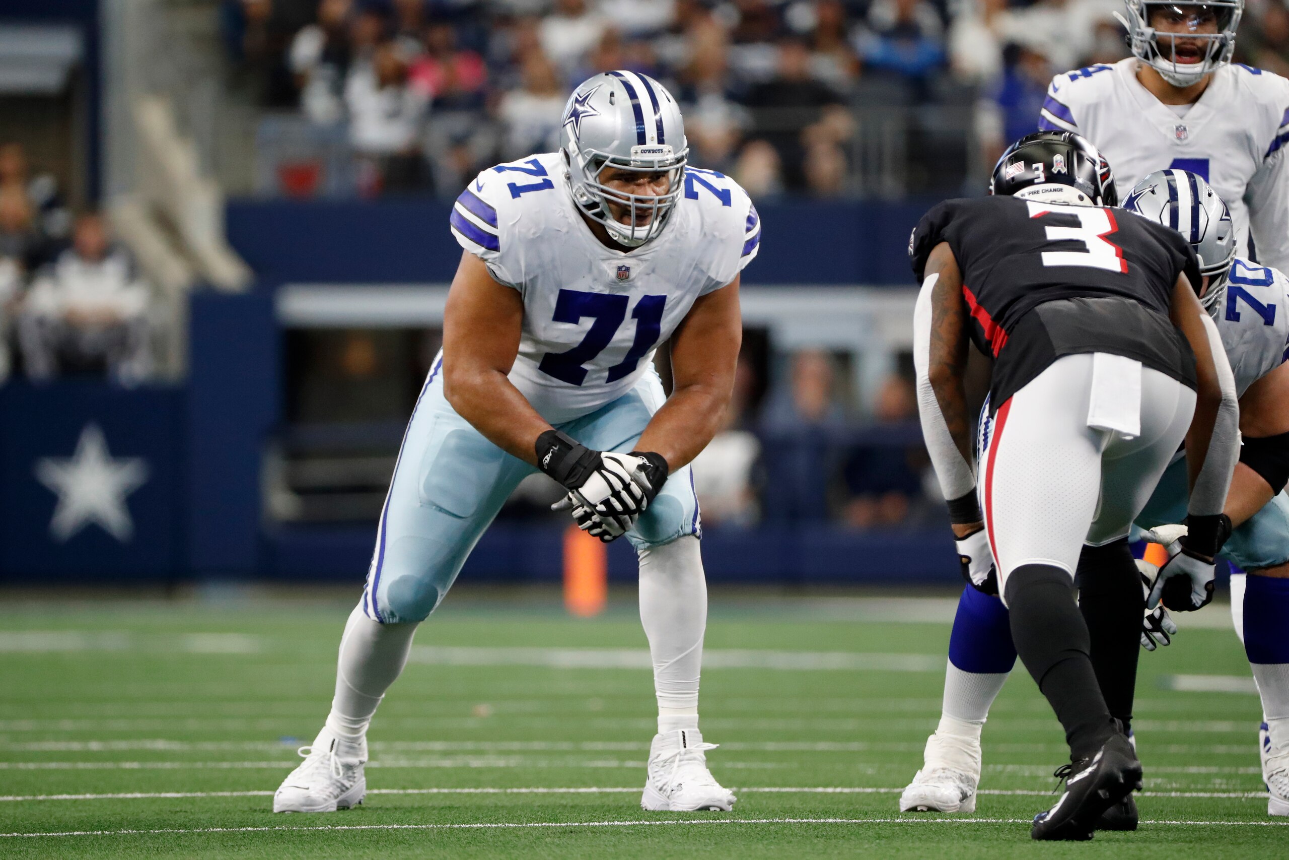 Dallas Cowboys offensive tackle La'el Collins (71) waits for the snap during the first half of an NFL football game against the Atlanta Falcons in Arlington, Texas, Sunday, Nov. 14, 2021. (AP Photo/Roger Steinman)