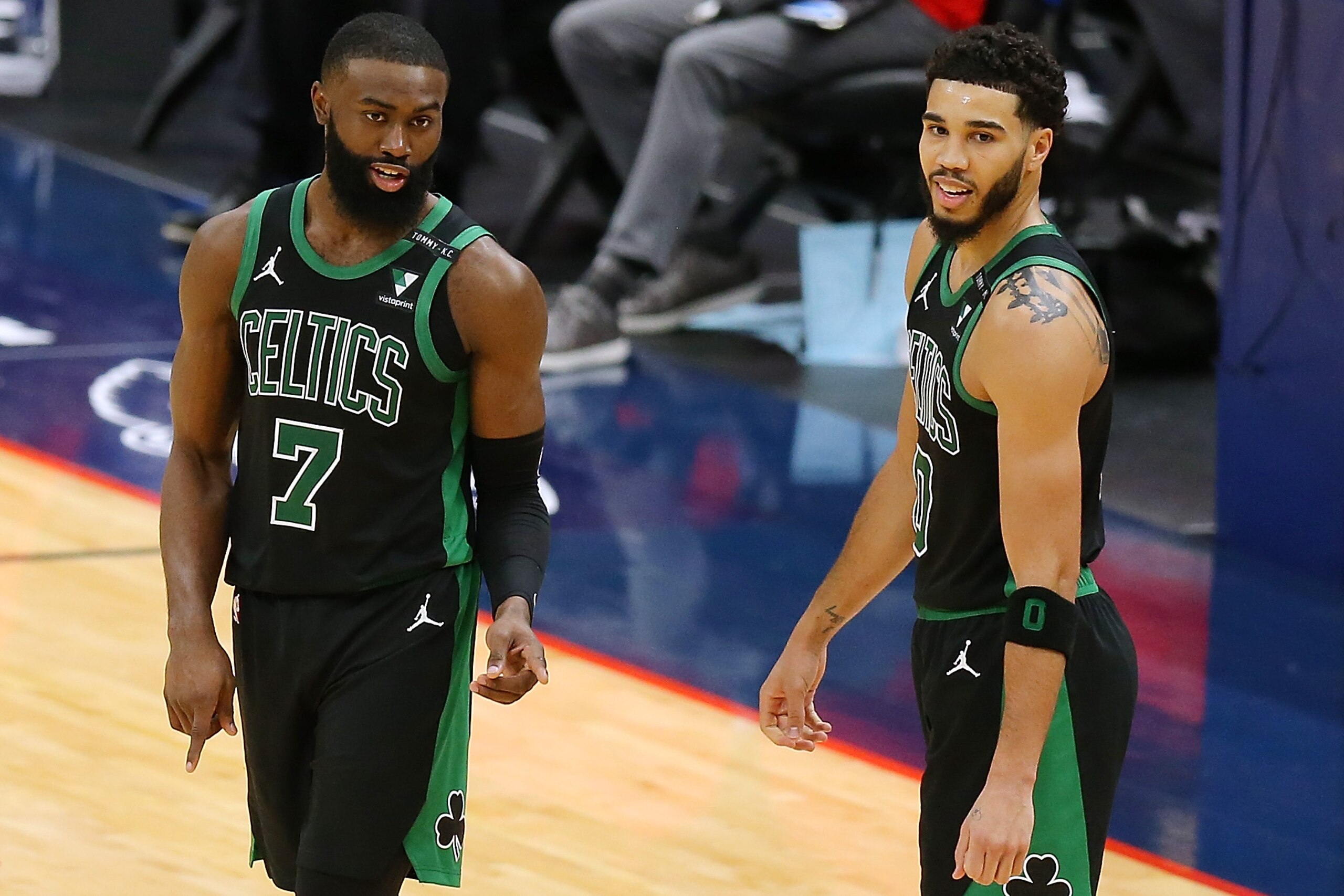 NEW ORLEANS, LOUISIANA - FEBRUARY 21: Jaylen Brown #7 of the Boston Celtics and Jayson Tatum #0 talk against the New Orleans Pelicans during a game at the Smoothie King Center on February 21, 2021 in New Orleans, Louisiana. NOTE TO USER: User expressly acknowledges and agrees that, by downloading and or using this Photograph, user is consenting to the terms and conditions of the Getty Images License Agreement. (Photo by Jonathan Bachman/Getty Images)