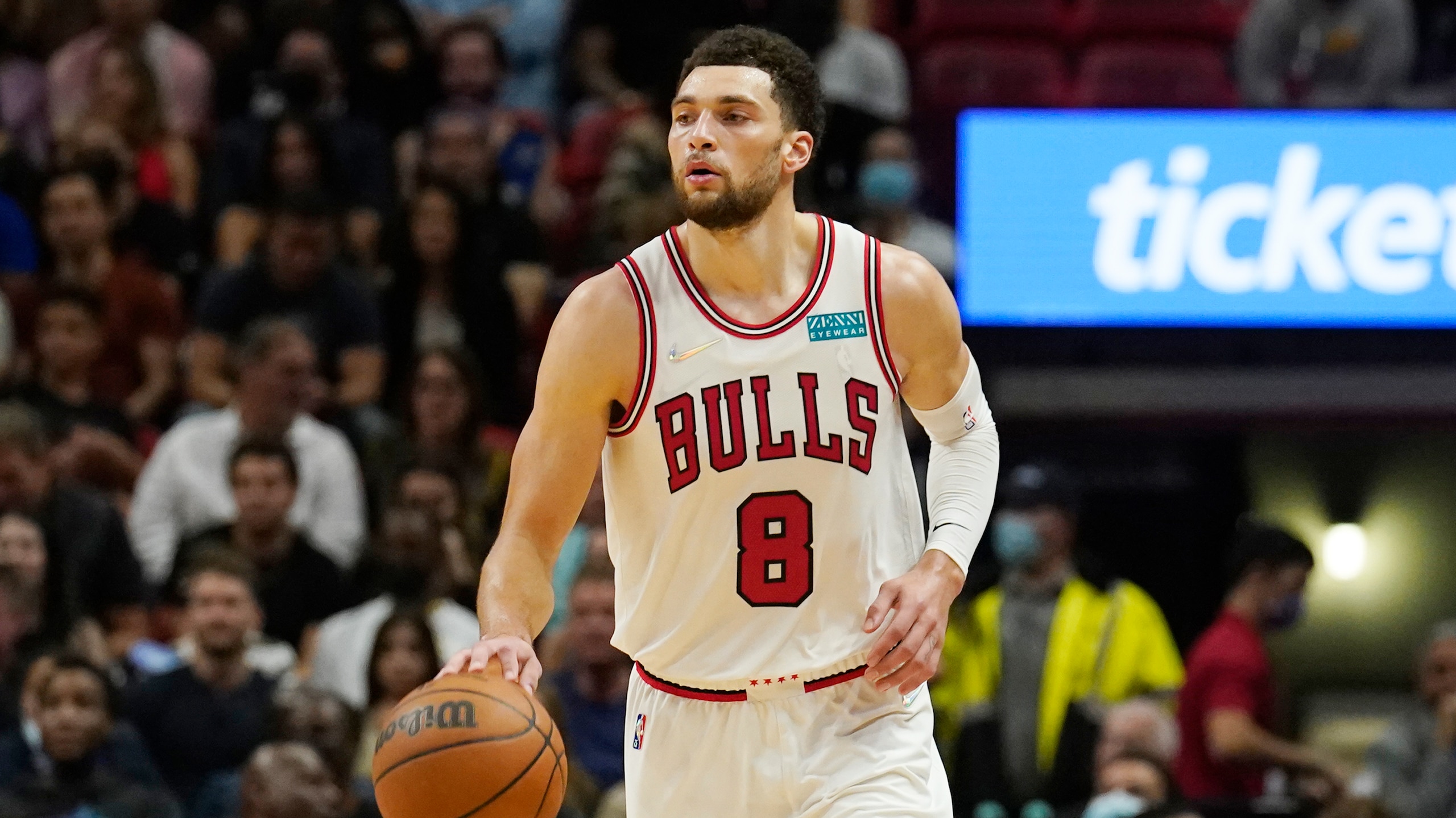 Chicago Bulls guard Zach LaVine (8) dribbles the ball during the second half of an NBA basketball game against the Miami Heat, Saturday, Dec. 11, 2021, in Miami. (AP Photo/Marta Lavandier)
