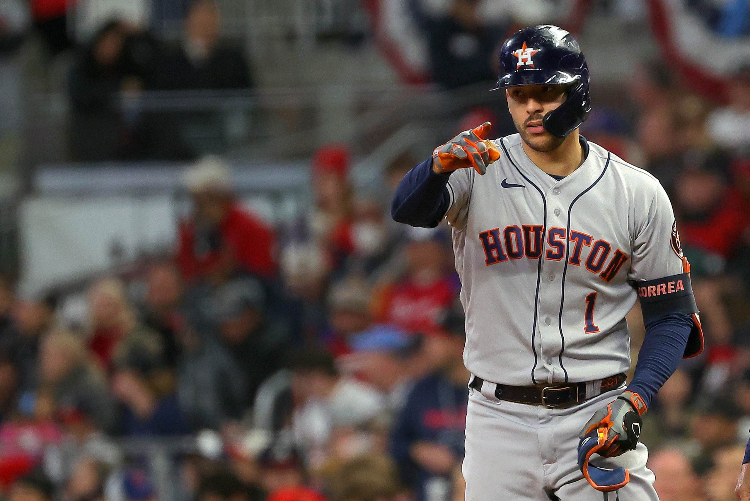 ATLANTA, GEORGIA - OCTOBER 30:  Carlos Correa #1 of the Houston Astros reacts after hitting a single against the Atlanta Braves during the third inning in Game Four of the World Series at Truist Park on October 30, 2021 in Atlanta, Georgia. (Photo by Kevin C. Cox/Getty Images)