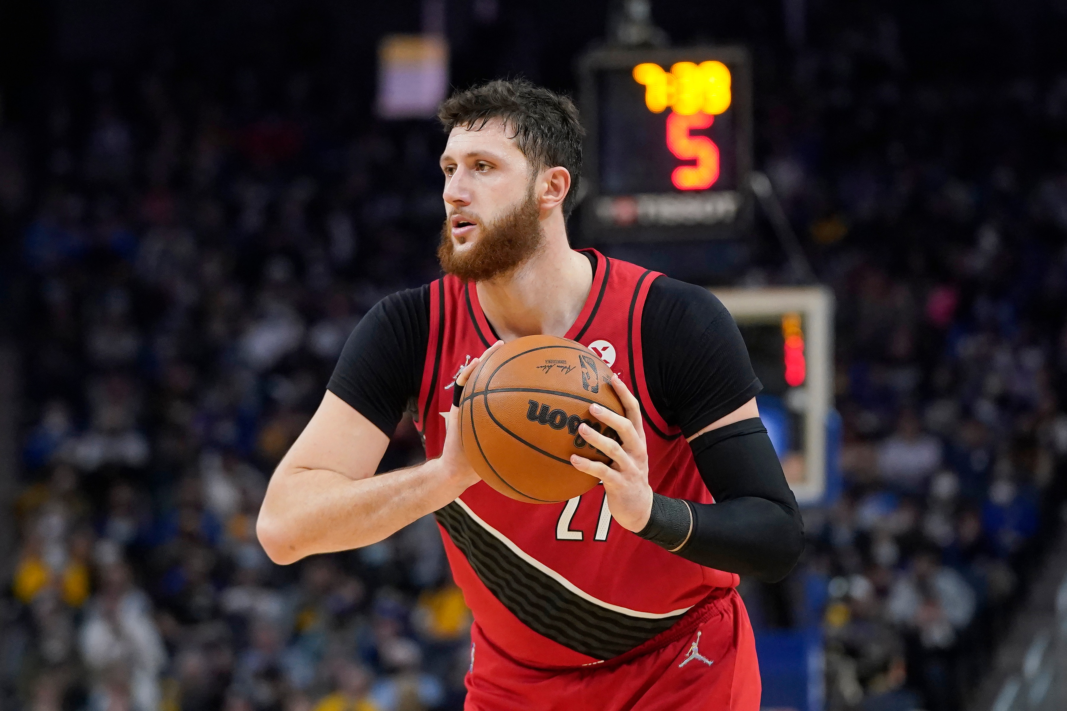Portland Trail Blazers center Jusuf Nurkic passes the ball during the second half of the team's NBA basketball game against the Golden State Warriors in San Francisco, Wednesday, Dec. 8, 2021. (AP Photo/Jeff Chiu)