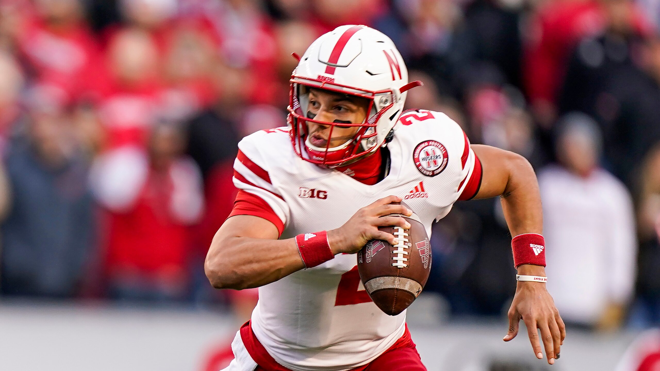 Nebraska quarterback Adrian Martinez (2) during the first half of an NCAA college football game against Wisconsin Saturday, Nov. 20, 2021, in Madison, Wis. (AP Photo/Andy Manis) Nebraska quarterback Adrian Martinez (2) during the first half of an NCAA college football game against Wisconsin Saturday, Nov. 20, 2021, in Madison, Wis. (AP Photo/Andy Manis)