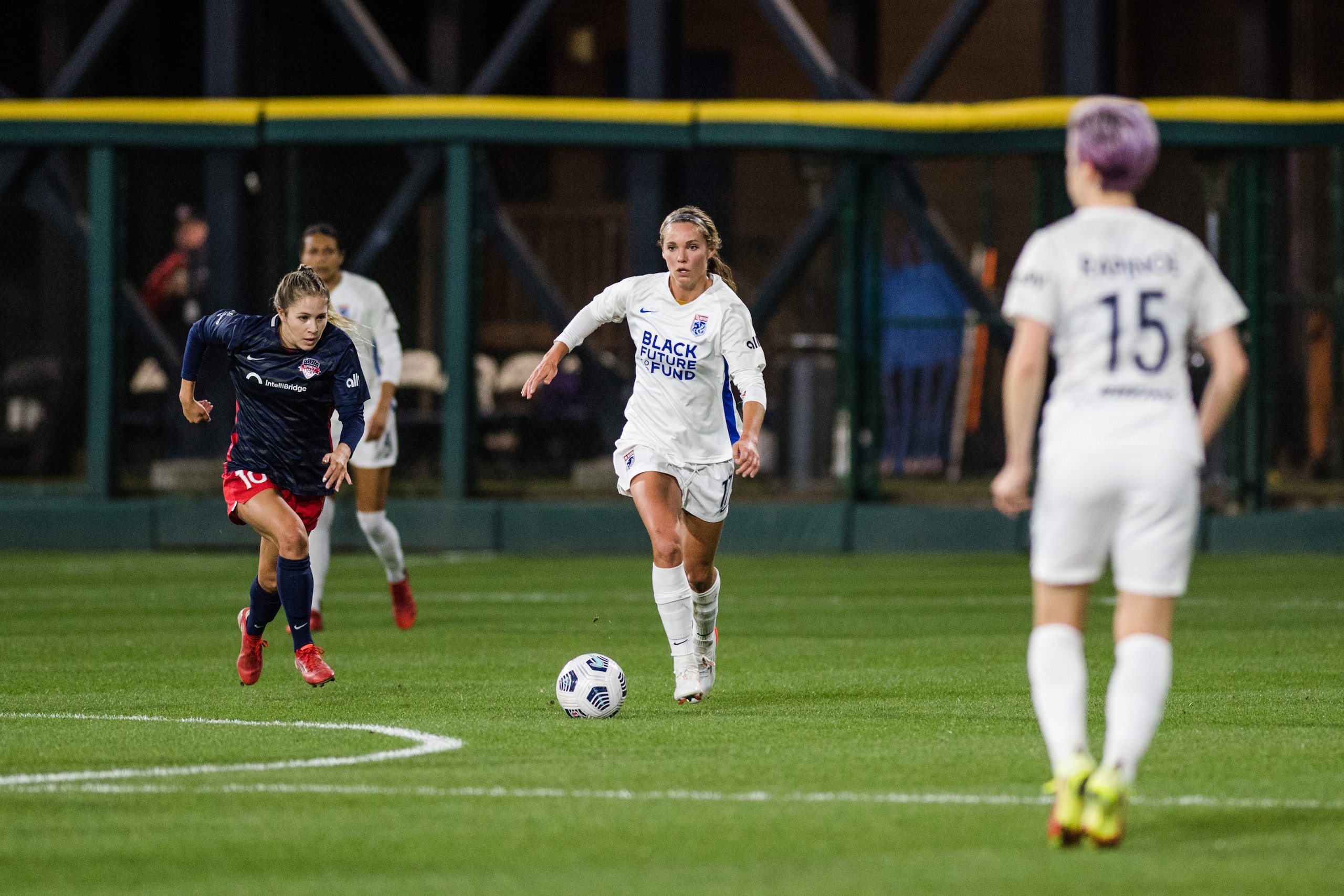 TACOMA, WA - OCTOBER 16: Dani Weatherholt #17 of the OL Reign looks for a pass during a game between Washington Spirit and OL Reign at Cheney Stadium on October 16, 2021 in Tacoma, Washington. (Photo by Jane Gershovich/ISI Photos/Getty Images)