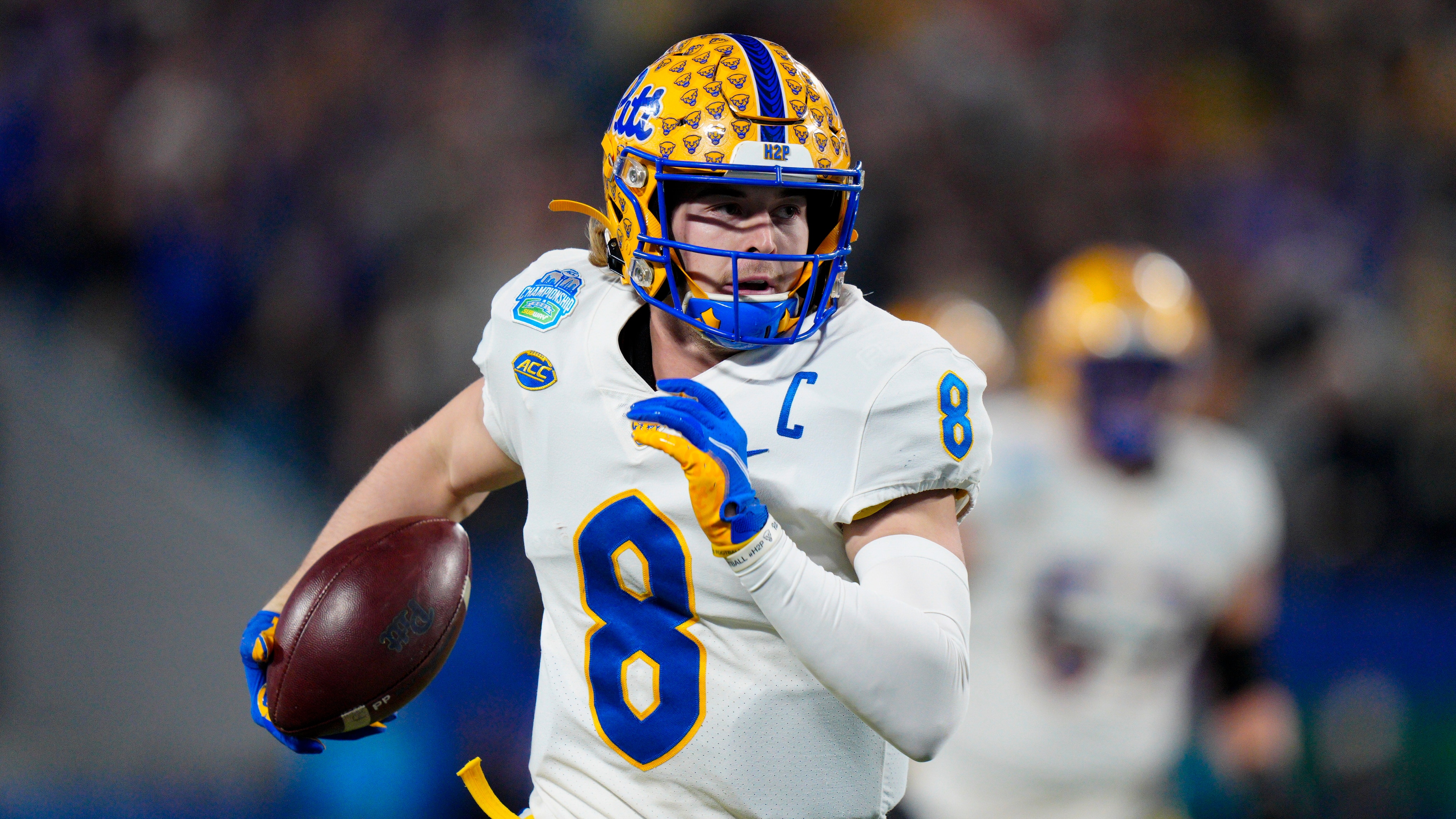 Pittsburgh quarterback Kenny Pickett scores against Wake Forest during the first half of the Atlantic Coast Conference championship NCAA college football game Saturday, Dec. 4, 2021, in Charlotte, N.C. (AP Photo/Jacob Kupferman)