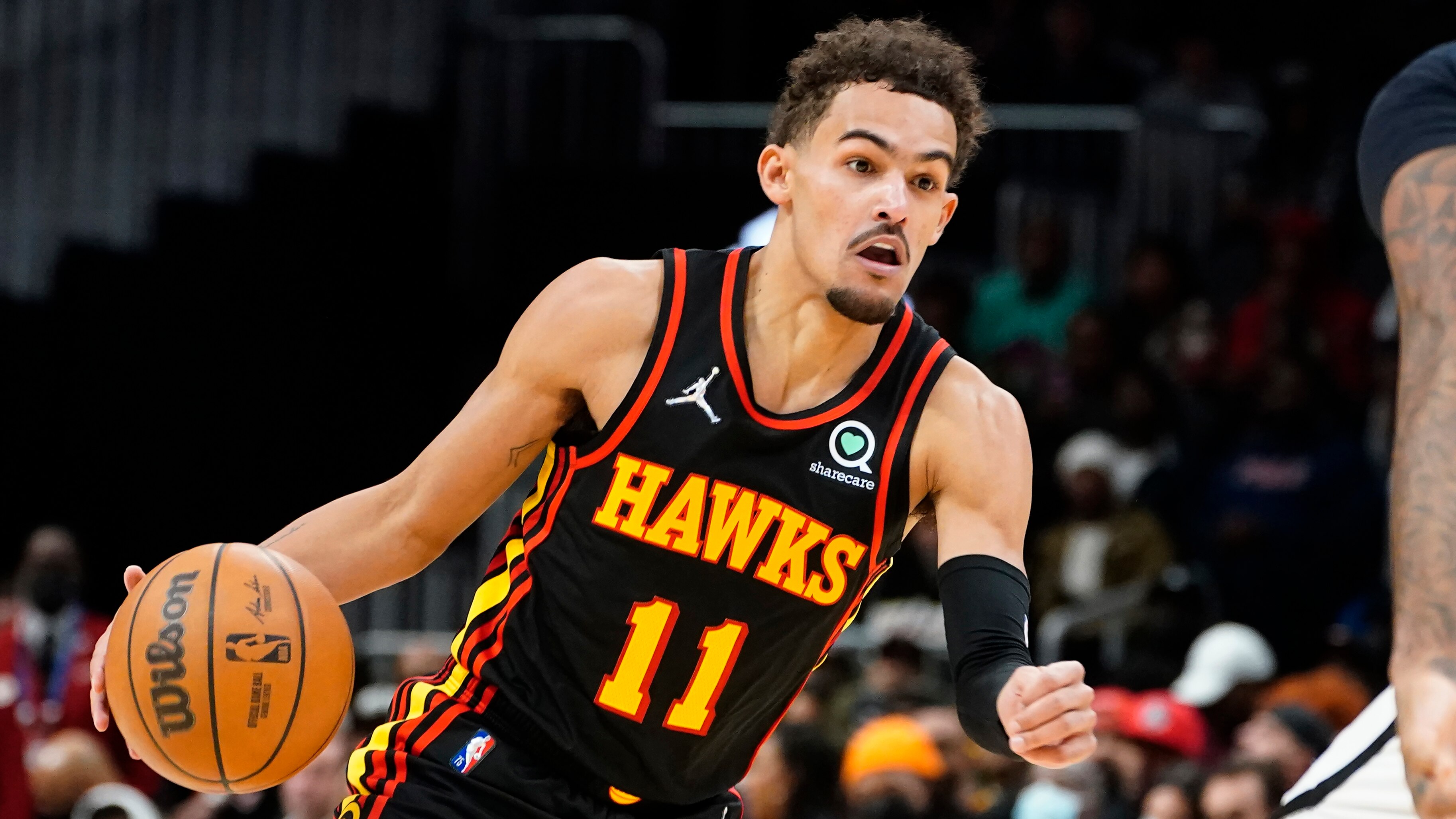 Atlanta Hawks guard Trae Young (11) is shown against the Brooklyn Nets during the first half of an NBA basketball game Friday, Dec. 10, 2021, in Atlanta. (AP Photo/John Bazemore)