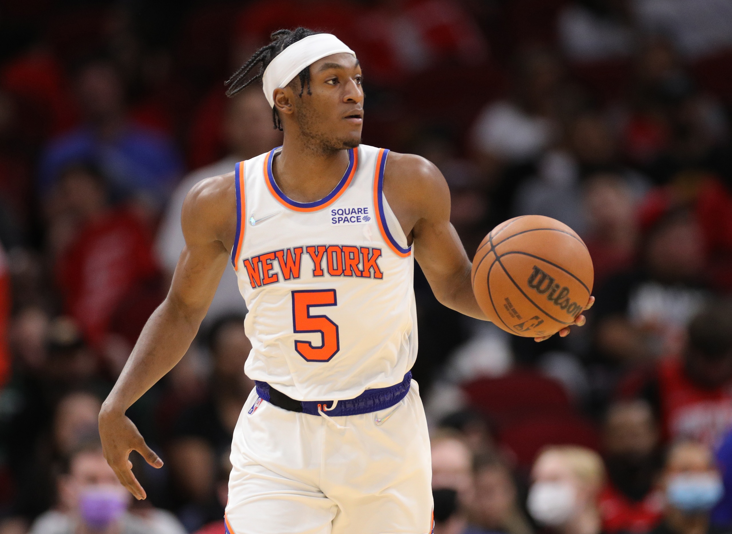HOUSTON, TEXAS - DECEMBER 16: Immanuel Quickley #5 of the New York Knicks controls the ball against the Houston Rockets during the second half at Toyota Center on December 16, 2021 in Houston, Texas. NOTE TO USER: User expressly acknowledges and agrees that, by downloading and or using this photograph, User is consenting to the terms and conditions of the Getty Images License Agreement. (Photo by Carmen Mandato/Getty Images)
