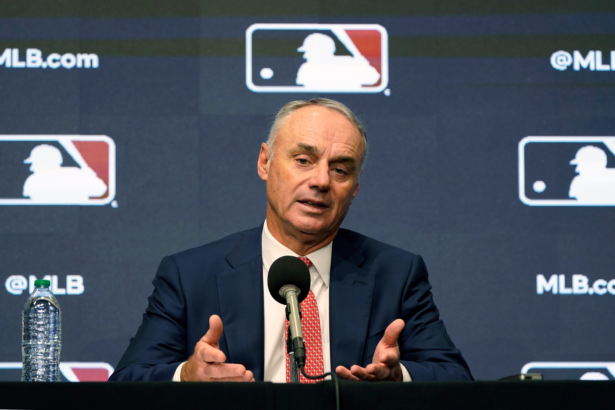 Major League Baseball commissioner Rob Manfred speaks during a news conference in Arlington, Texas, Thursday, Dec. 2, 2021. Owners locked out players at 12:01 a.m. Thursday following the expiration of the sport's five-year collective bargaining agreement. (AP Photo/LM Otero) Major League Baseball commissioner Rob Manfred speaks during a news conference in Arlington, Texas, Thursday, Dec. 2, 2021. Owners locked out players at 12:01 a.m. Thursday following the expiration of the sport's five-year collective bargaining agreement. (AP Photo/LM Otero)