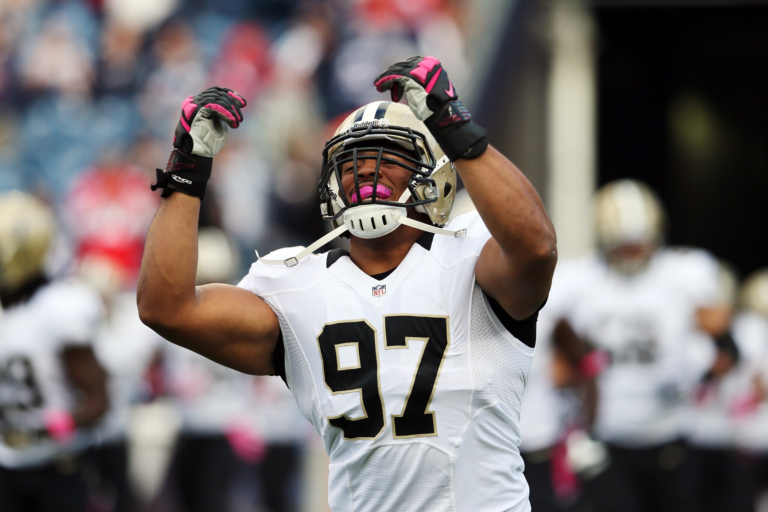 FOXBORO, MA - OCTOBER 13:  Defensive end Glenn Foster #97 of the New Orleans Saints takes the field before the start of the Saints and New England Patriots game at Gillette Stadium on October 13, 2013 in Foxboro, Massachusetts.  (Photo by Rob Carr/Getty Images) 