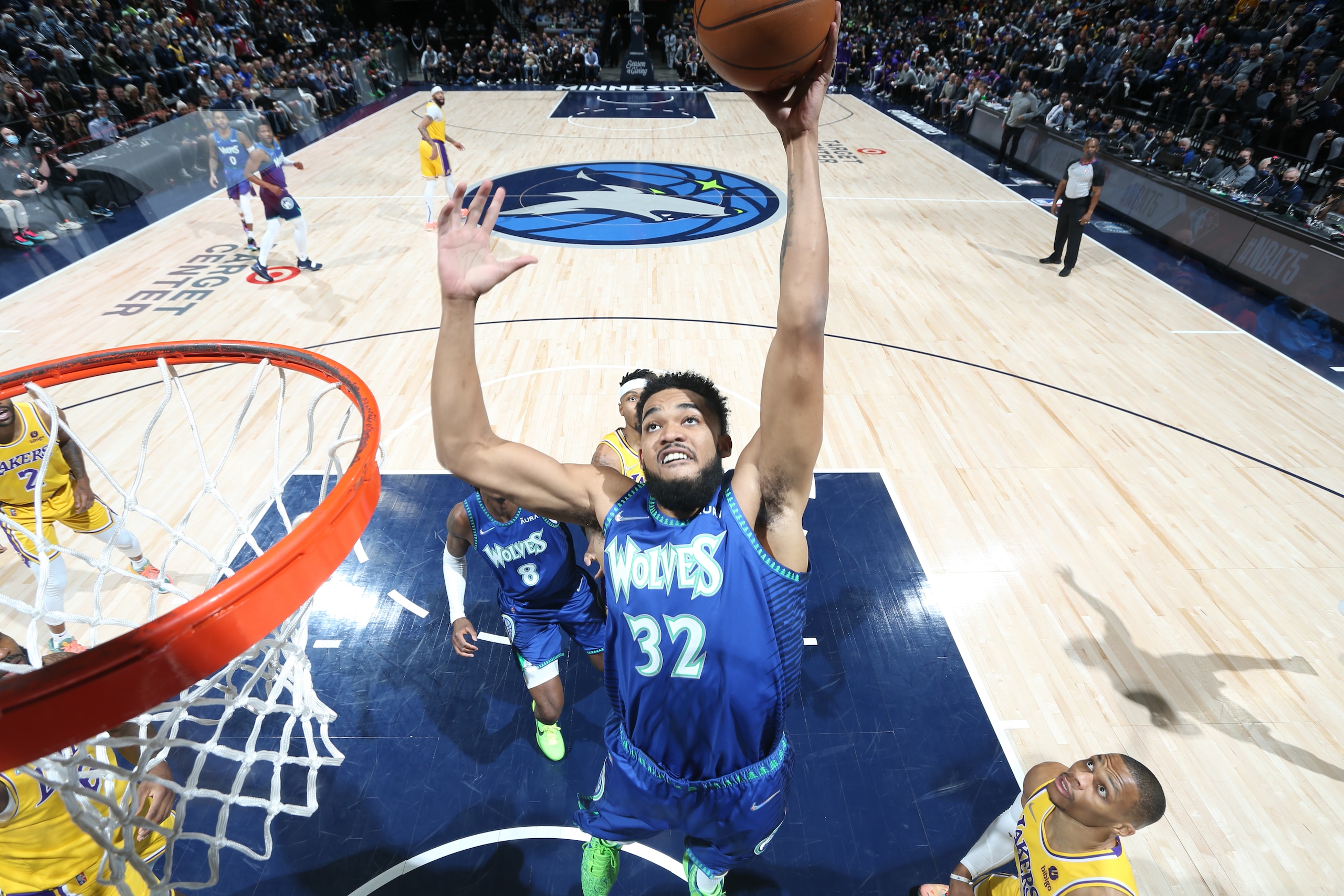 MINNEAPOLIS, MN -  DECEMBER 17: Karl-Anthony Towns #32 of the Minnesota Timberwolves drives to the basket during the game against the Los Angeles Lakers on December 17, 2021 at Target Center in Minneapolis, Minnesota. NOTE TO USER: User expressly acknowledges and agrees that, by downloading and or using this Photograph, user is consenting to the terms and conditions of the Getty Images License Agreement. Mandatory Copyright Notice: Copyright 2021 NBAE (Photo by David Sherman/NBAE via Getty Images)