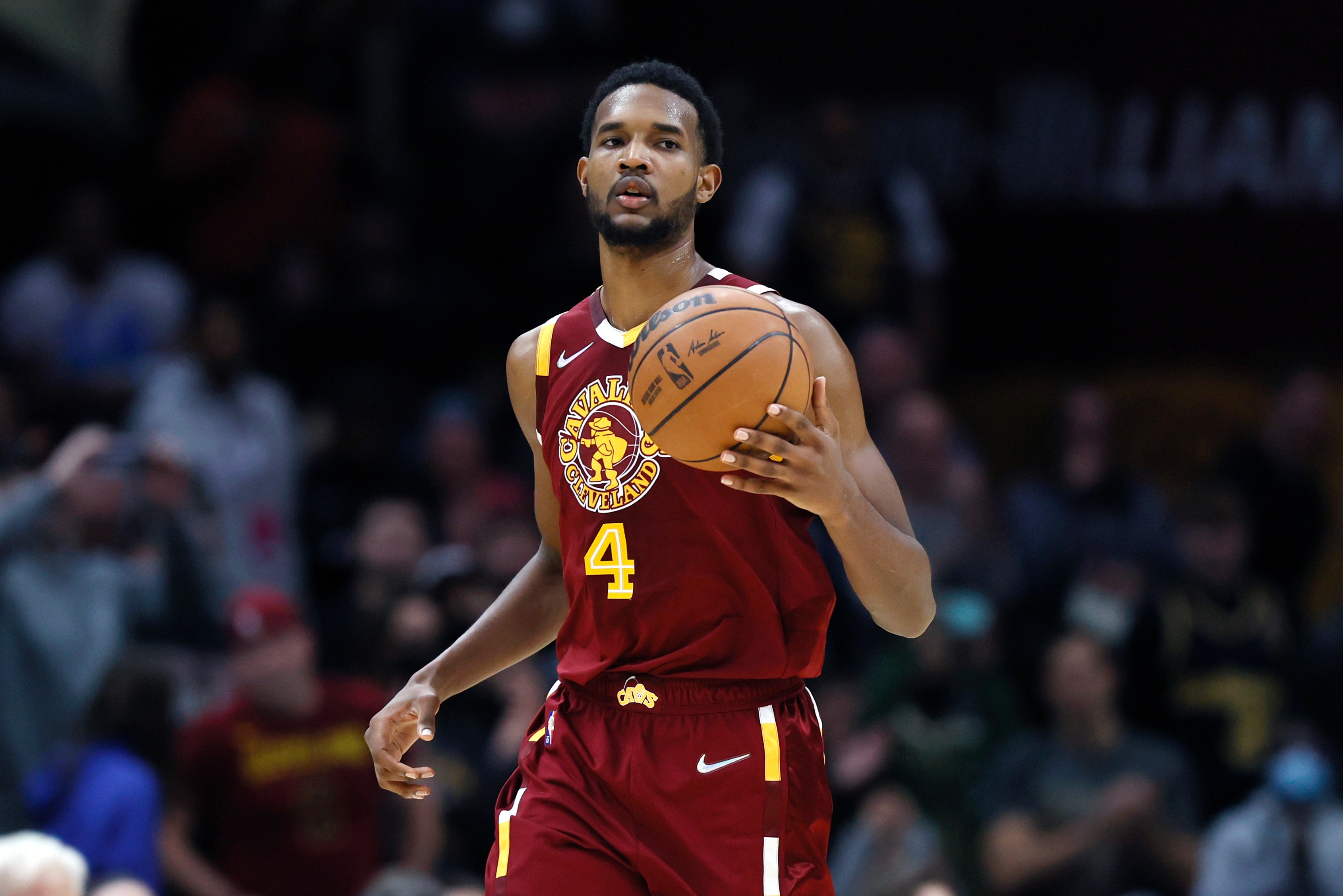 CLEVELAND, OH - DECEMBER 11: Evan Mobley #4 of the Cleveland Cavaliers playa against the Sacramento Kings during the second half at Rocket Mortgage Fieldhouse on December 11, 2021 in Cleveland, Ohio. The Cavaliers defeated the Kings 117-103. NOTE TO USER: User expressly acknowledges and agrees that, by downloading and or using this photograph, User is consenting to the terms and conditions of the Getty Images License Agreement. (Photo by Ron Schwane/Getty Images)