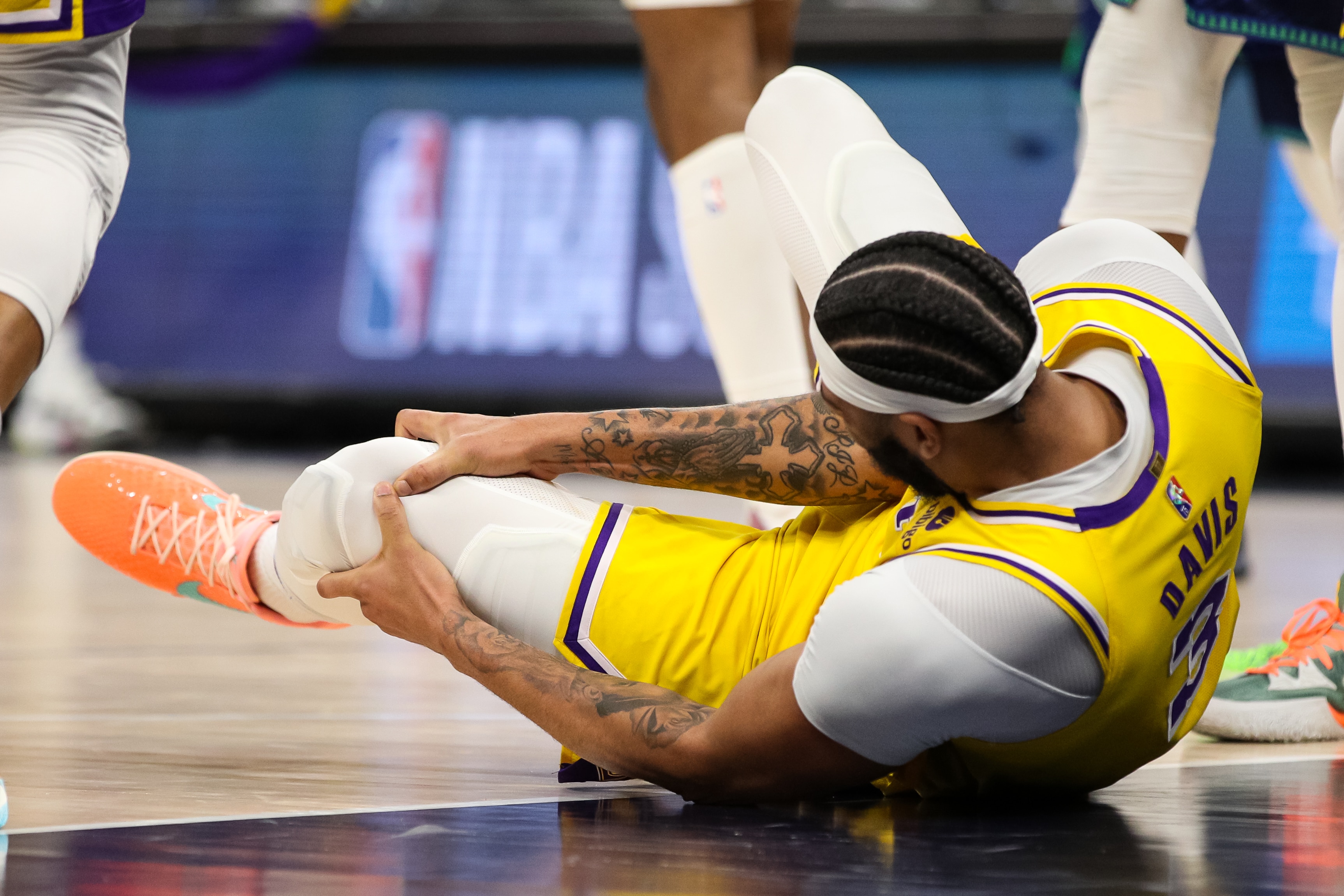 MINNEAPOLIS, MN - DECEMBER 17: Anthony Davis #3 of the Los Angeles Lakers reacts after getting injured in the third quarter. Davis did not return against the Minnesota Timberwolves at Target Center on December 17, 2021 in Minneapolis, Minnesota. The Timberwolves defeated the Lakers 110-92. NOTE TO USER: User expressly acknowledges and agrees that, by downloading and or using this Photograph, user is consenting to the terms and conditions of the Getty Images License Agreement. (Photo by David Berding/Getty Images)