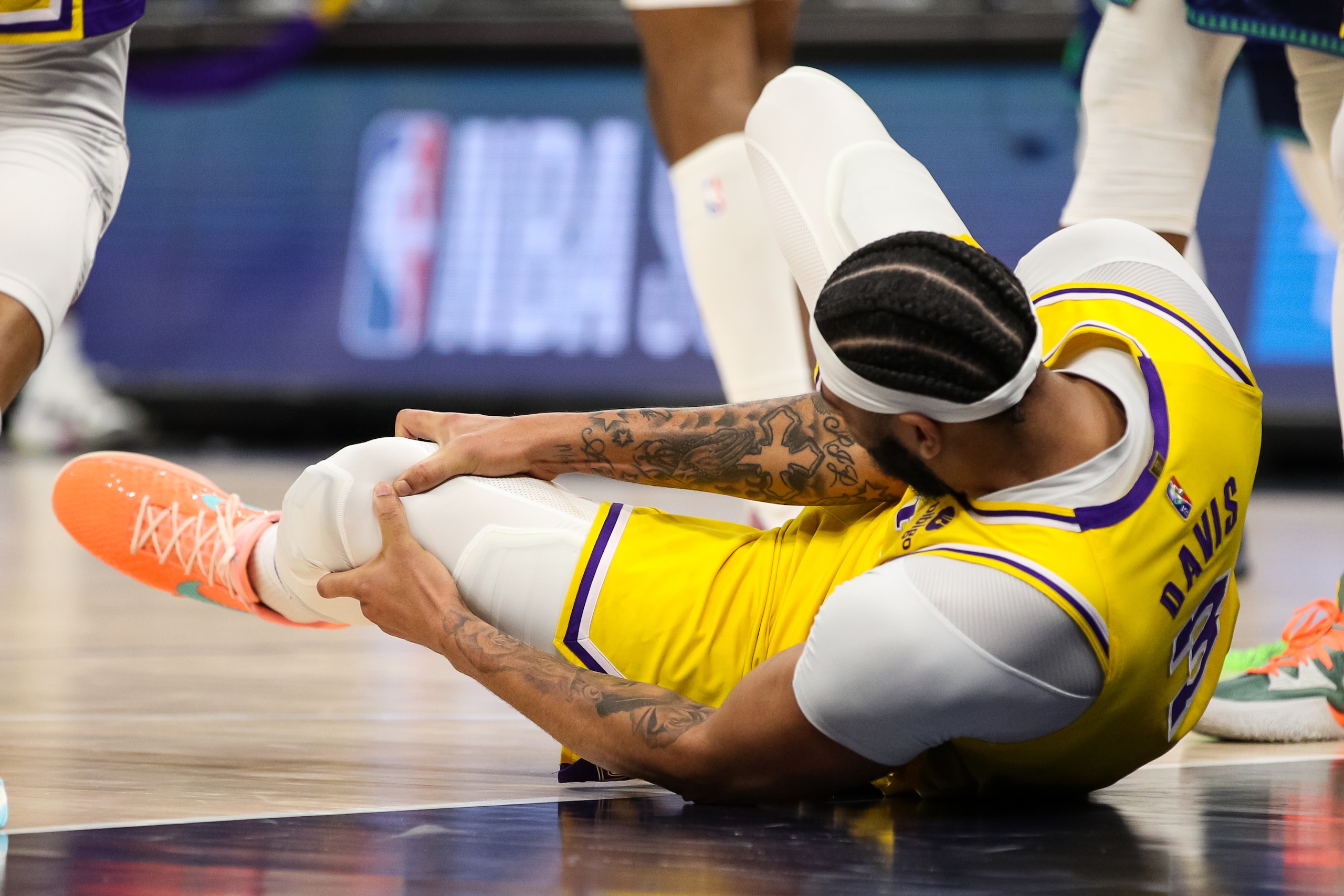 MINNEAPOLIS, MN - DECEMBER 17: Anthony Davis #3 of the Los Angeles Lakers reacts after getting injured in the third quarter. Davis did not return against the Minnesota Timberwolves at Target Center on December 17, 2021 in Minneapolis, Minnesota. The Timberwolves defeated the Lakers 110-92. NOTE TO USER: User expressly acknowledges and agrees that, by downloading and or using this Photograph, user is consenting to the terms and conditions of the Getty Images License Agreement. (Photo by David Berding/Getty Images)