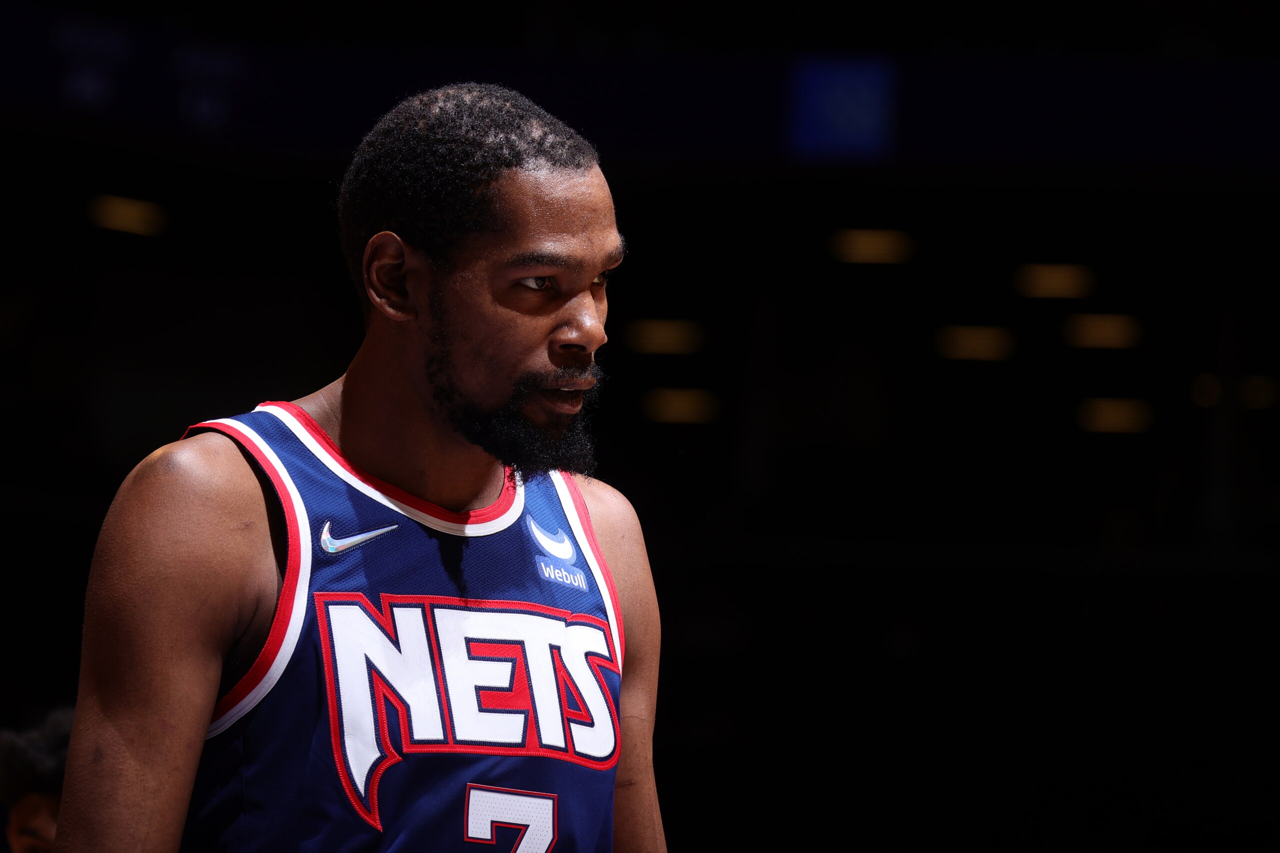 BROOKLYN, NY - DECEMBER 16: Kevin Durant #7 of the Brooklyn Nets looks on during the game against the Philadelphia 76ers on December 16, 2021 at Barclays Center in Brooklyn, New York. NOTE TO USER: User expressly acknowledges and agrees that, by downloading and or using this Photograph, user is consenting to the terms and conditions of the Getty Images License Agreement. Mandatory Copyright Notice: Copyright 2021 NBAE (Photo by Nathaniel S. Butler/NBAE via Getty Images)