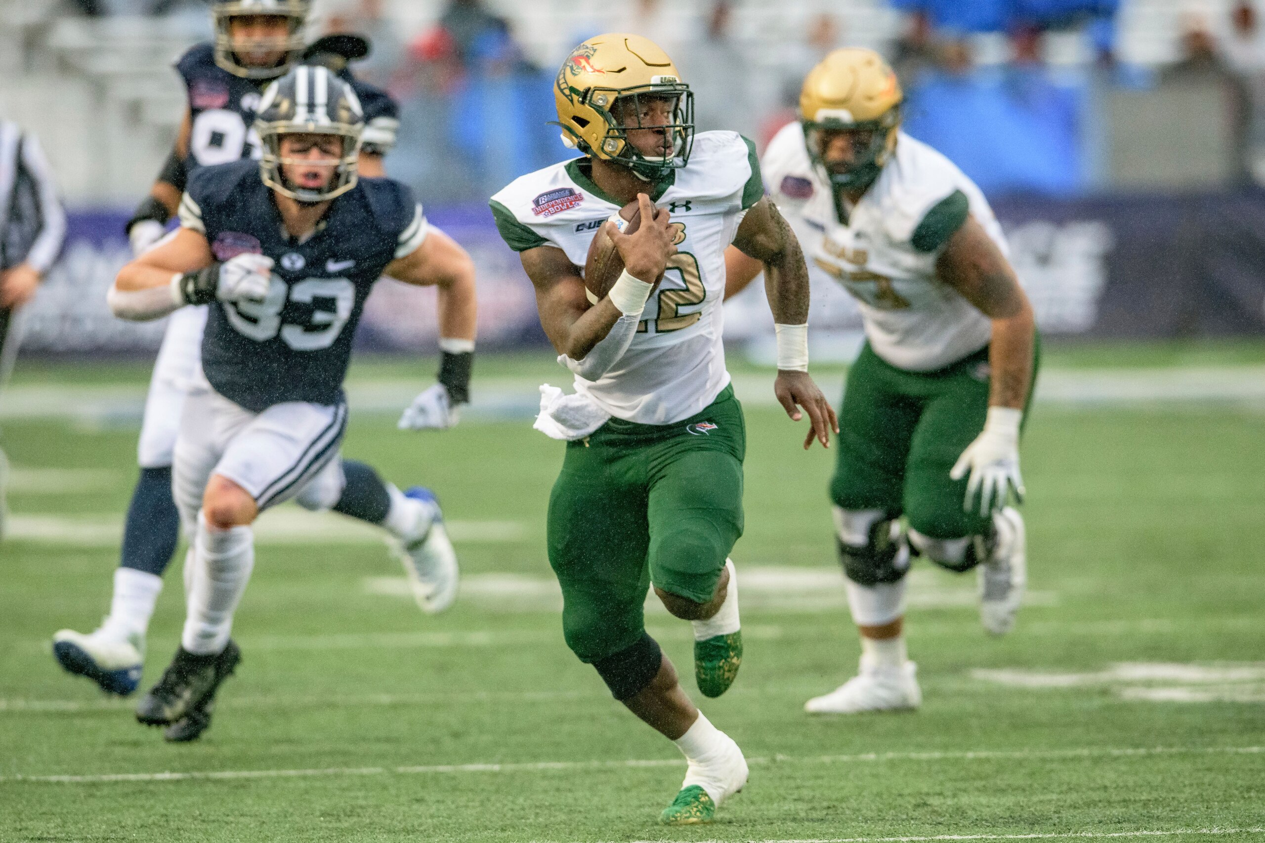 UAB running back DeWayne McBride (22) breaks free for a touchdown run during the first half of the Independence Bowl NCAA college football game against BYU in Shreveport, La., Saturday, Dec. 18, 2021. (AP Photo/Matthew Hinton)