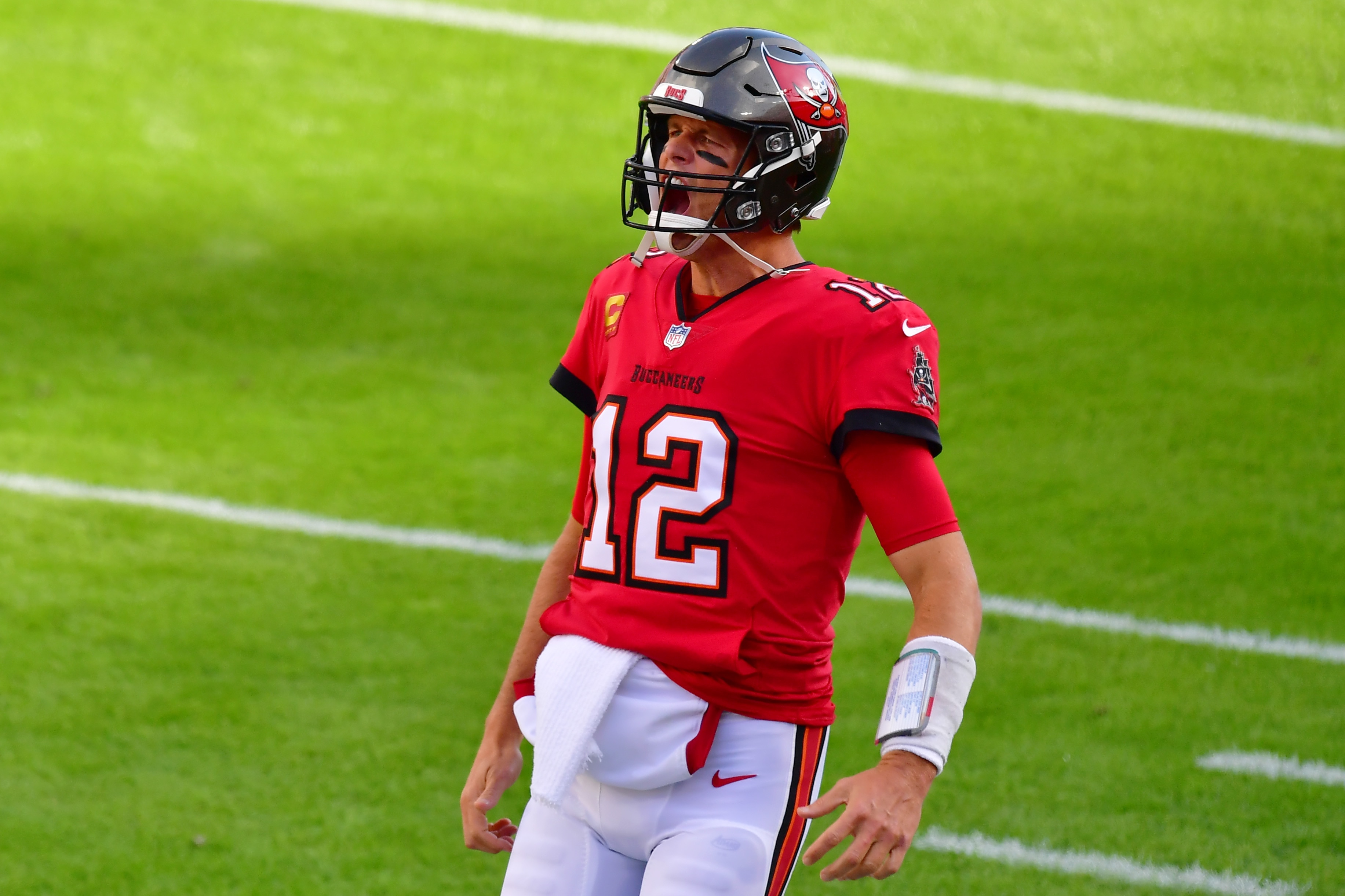TAMPA, FLORIDA - DECEMBER 12: Tom Brady #12 of the Tampa Bay Buccaneers reacts prior to a game against the Buffalo Bills at Raymond James Stadium on December 12, 2021 in Tampa, Florida. (Photo by Julio Aguilar/Getty Images)