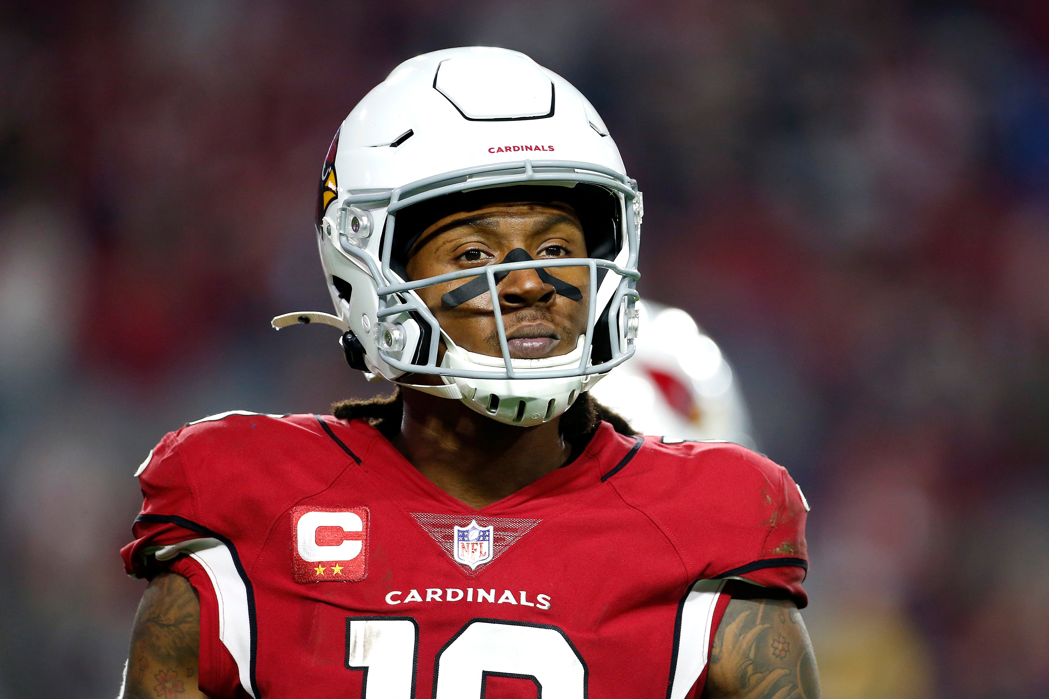 Arizona Cardinals wide receiver DeAndre Hopkins looks to the sideline during a timeout in second half of an NFL football game against the Los Angeles Rams, Monday, Dec. 13, 2021, in Glendale, Ariz. (AP Photo/Ralph Freso)