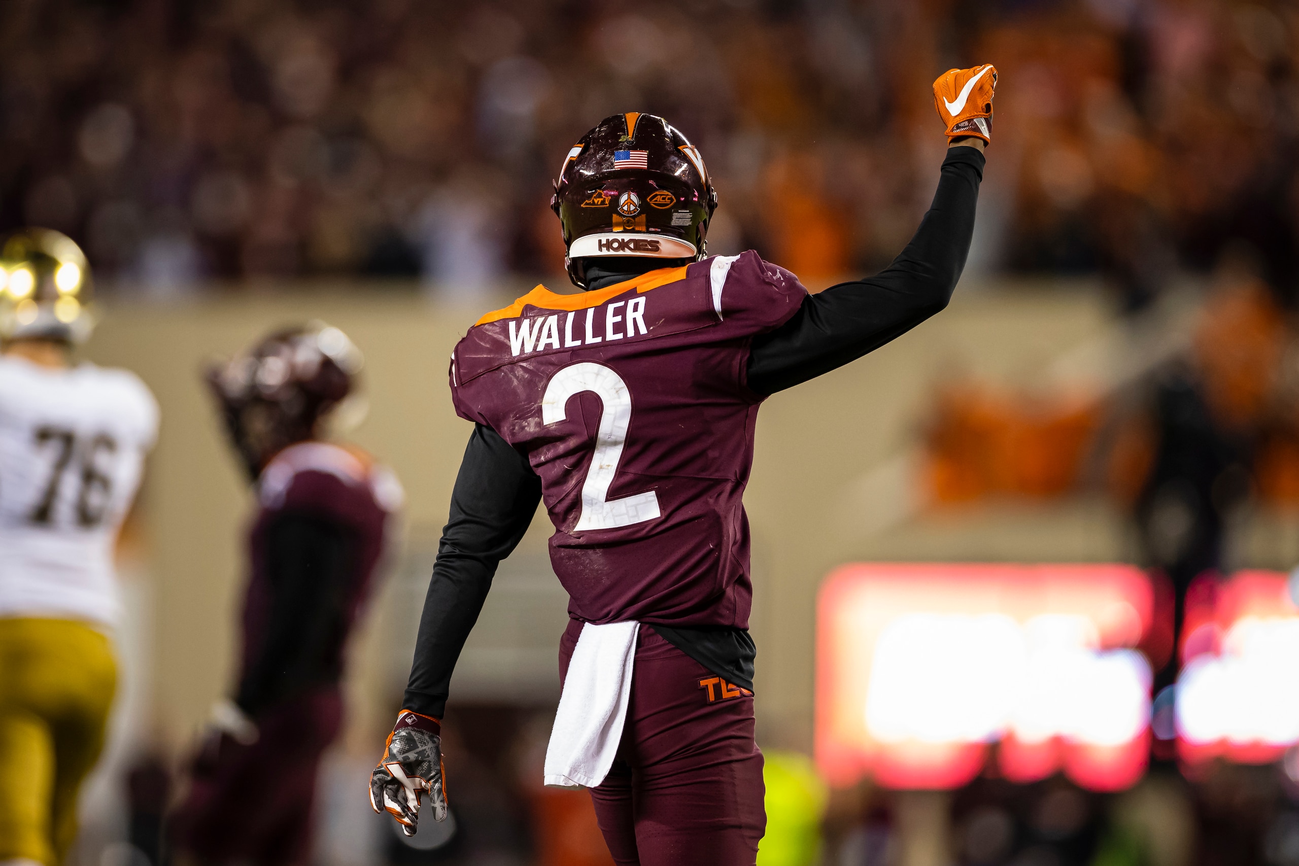 BLACKSBURG, VA - OCTOBER 09: Jermaine Waller #2 of the Virginia Tech Hokies reacts to a play against the Notre Dame Fighting Irish during the second half of the game at Lane Stadium on October 9, 2021 in Blacksburg, Virginia. (Photo by Scott Taetsch/Getty Images)
