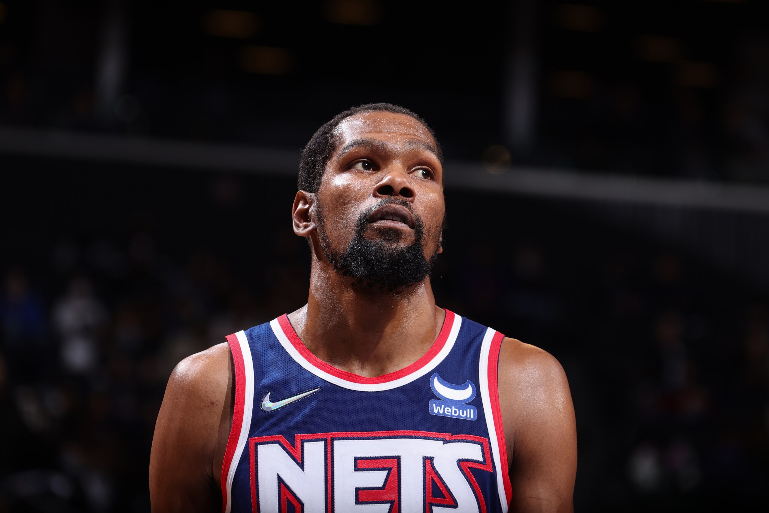 BROOKLYN, NY - DECEMBER 16: Kevin Durant #7 of the Brooklyn Nets looks on during the game against the Philadelphia 76ers on December 16, 2021 at Barclays Center in Brooklyn, New York. NOTE TO USER: User expressly acknowledges and agrees that, by downloading and or using this Photograph, user is consenting to the terms and conditions of the Getty Images License Agreement. Mandatory Copyright Notice: Copyright 2021 NBAE (Photo by Nathaniel S. Butler/NBAE via Getty Images)