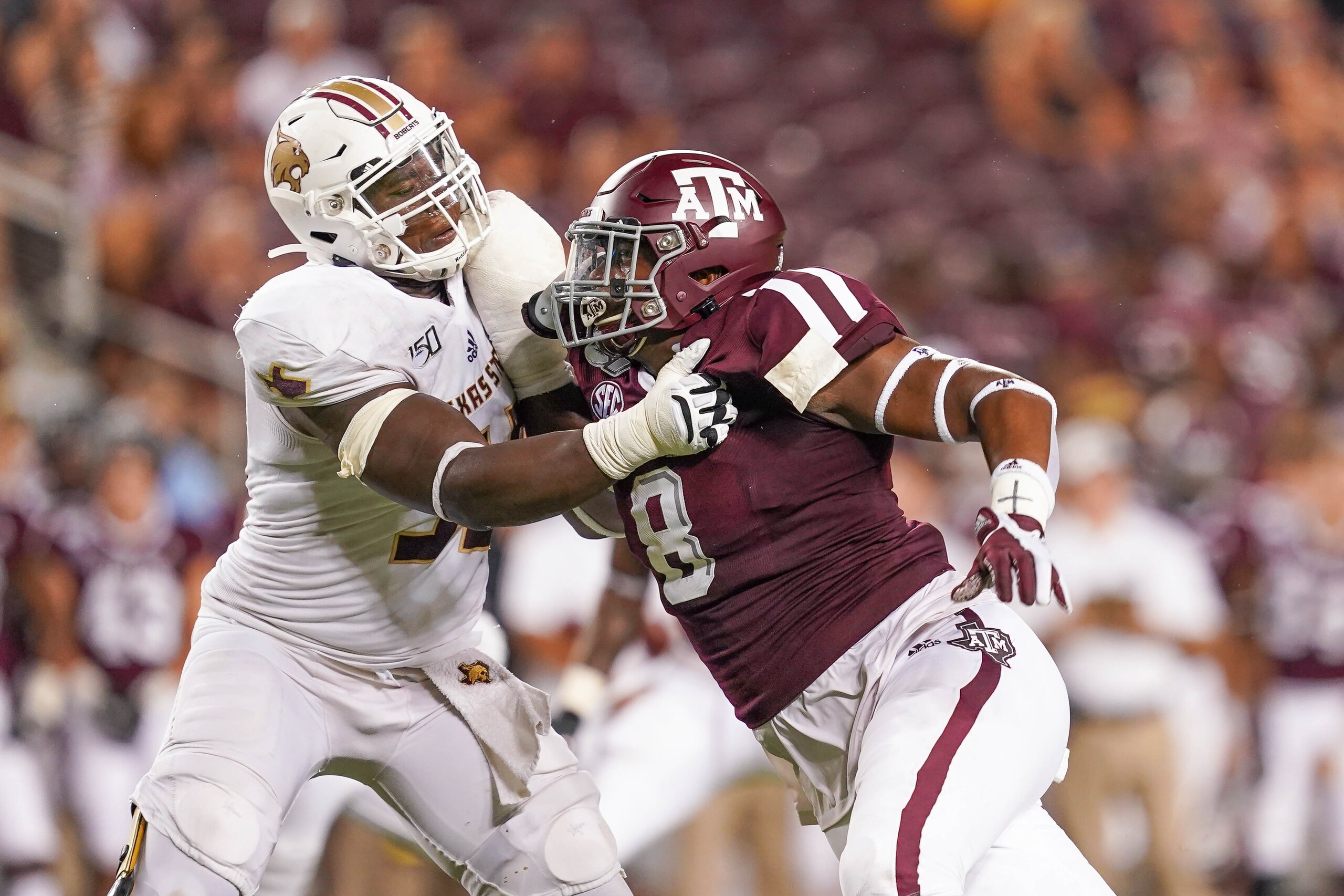 COLLEGE STATION, TX - AUGUST 29: Texas A&M Aggies defensive lineman DeMarvin Leal (8) rushes in during the game between the Texas State Bobcats and Texas A&M Aggies on August 29, 2019 at Kyle Field in College Station, Texas.  (Photo by Daniel Dunn/Icon Sportswire via Getty Images)