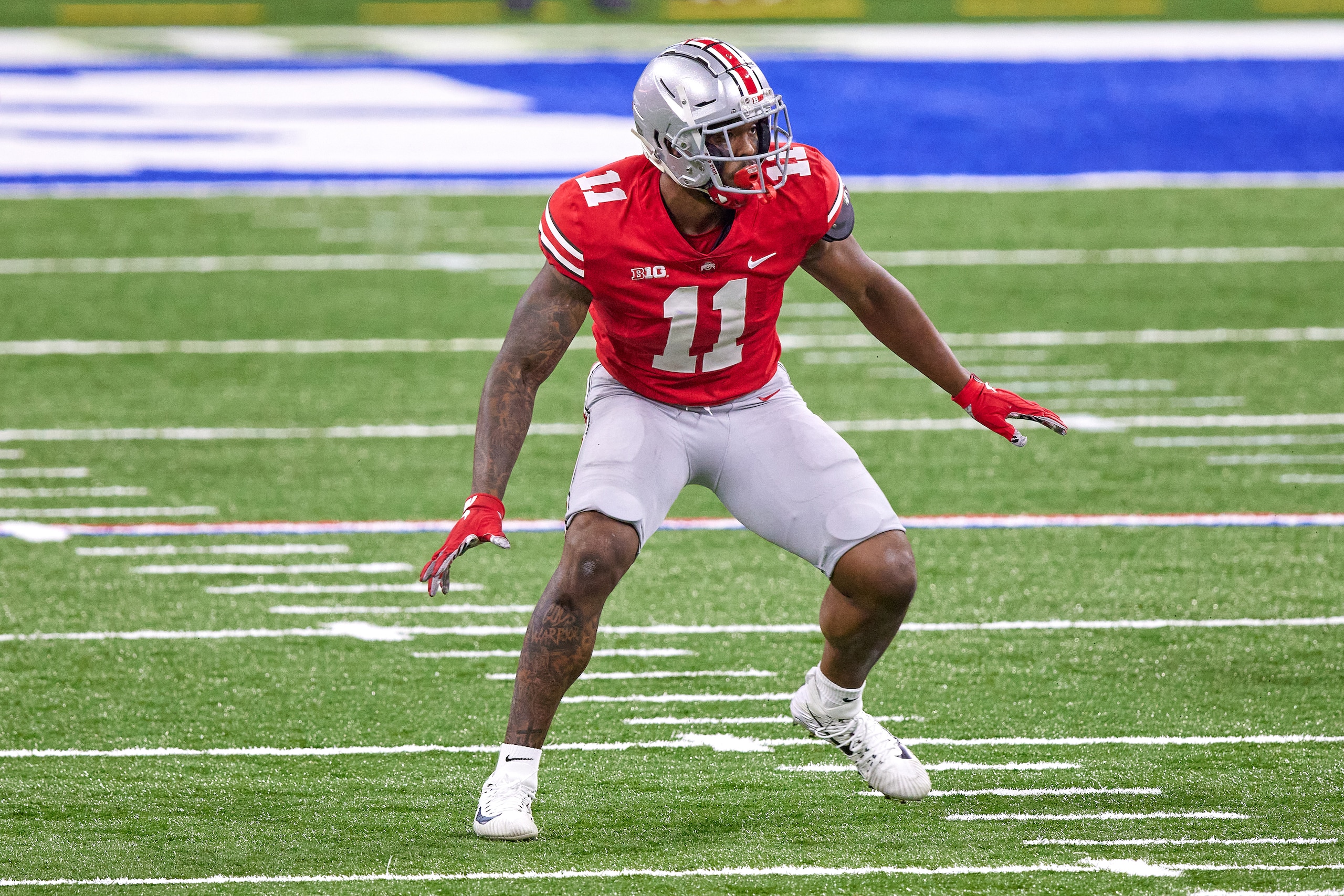 INDIANAPOLIS, IN - DECEMBER 19: Ohio State Buckeyes defensive end Tyreke Smith (11) runs in action during the Big Ten Championship game between the Ohio State Buckeyes and the Northwestern Wildcats on December 19, 2020 at Lucas Oil stadium, in Indianapolis, IN. (Photo by Robin Alam/Icon Sportswire via Getty Images) INDIANAPOLIS, IN - DECEMBER 19: Ohio State Buckeyes defensive end Tyreke Smith (11) runs in action during the Big Ten Championship game between the Ohio State Buckeyes and the Northwestern Wildcats on December 19, 2020 at Lucas Oil stadium, in Indianapolis, IN. (Photo by Robin Alam/Icon Sportswire via Getty Images)