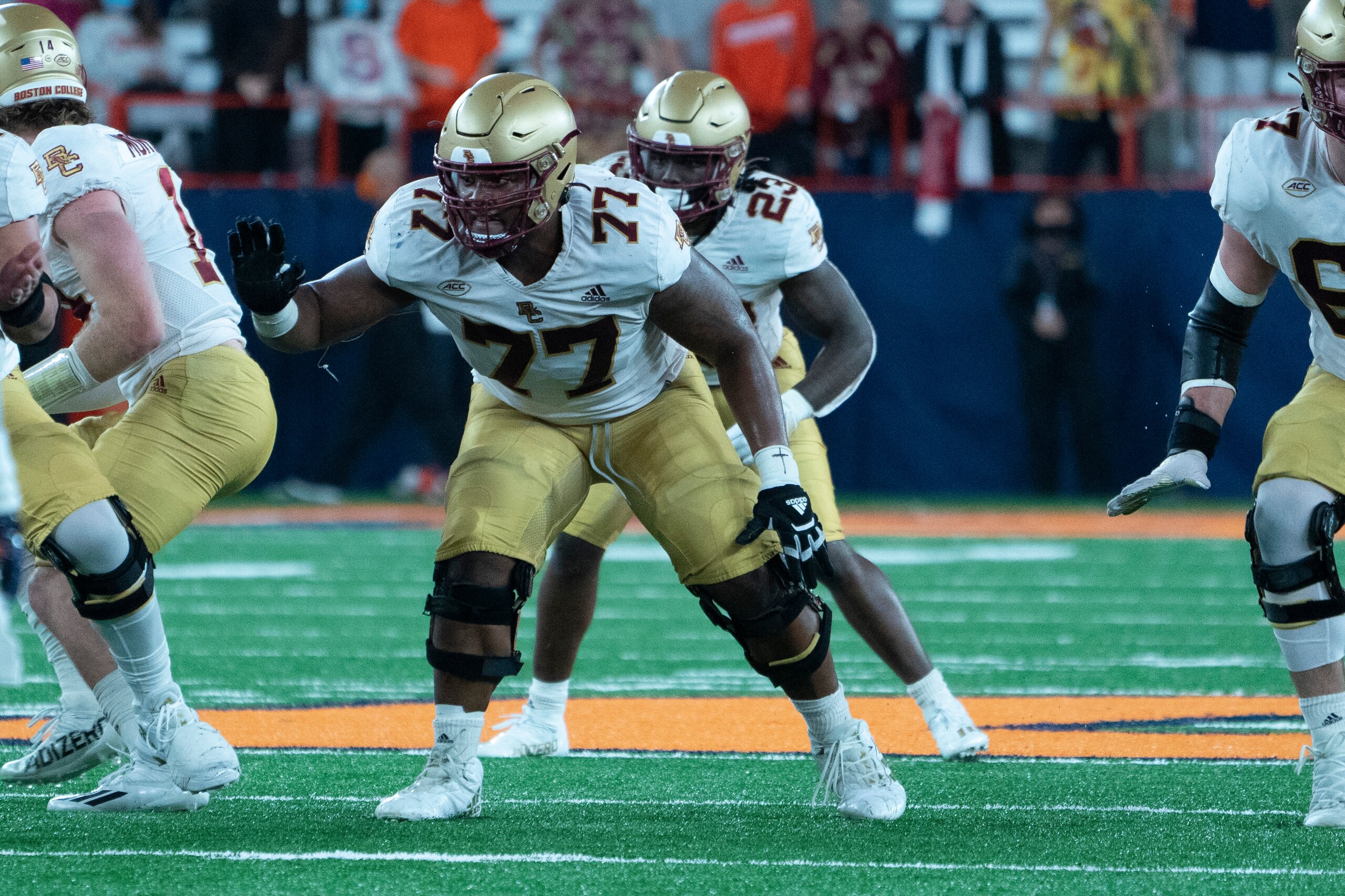 SYRACUSE, NY - OCTOBER 30: Boston College Eagles Offensive Lineman Zion Johnson (77) looks to block during the second half of the College Football game between the Boston College Eagles and the Syracuse Orange on October 30, 2021, at the Carrier Dome in Syracuse, NY. (Photo by Gregory Fisher/Icon Sportswire via Getty Images) SYRACUSE, NY - OCTOBER 30: Boston College Eagles Offensive Lineman Zion Johnson (77) looks to block during the second half of the College Football game between the Boston College Eagles and the Syracuse Orange on October 30, 2021, at the Carrier Dome in Syracuse, NY. (Photo by Gregory Fisher/Icon Sportswire via Getty Images)
