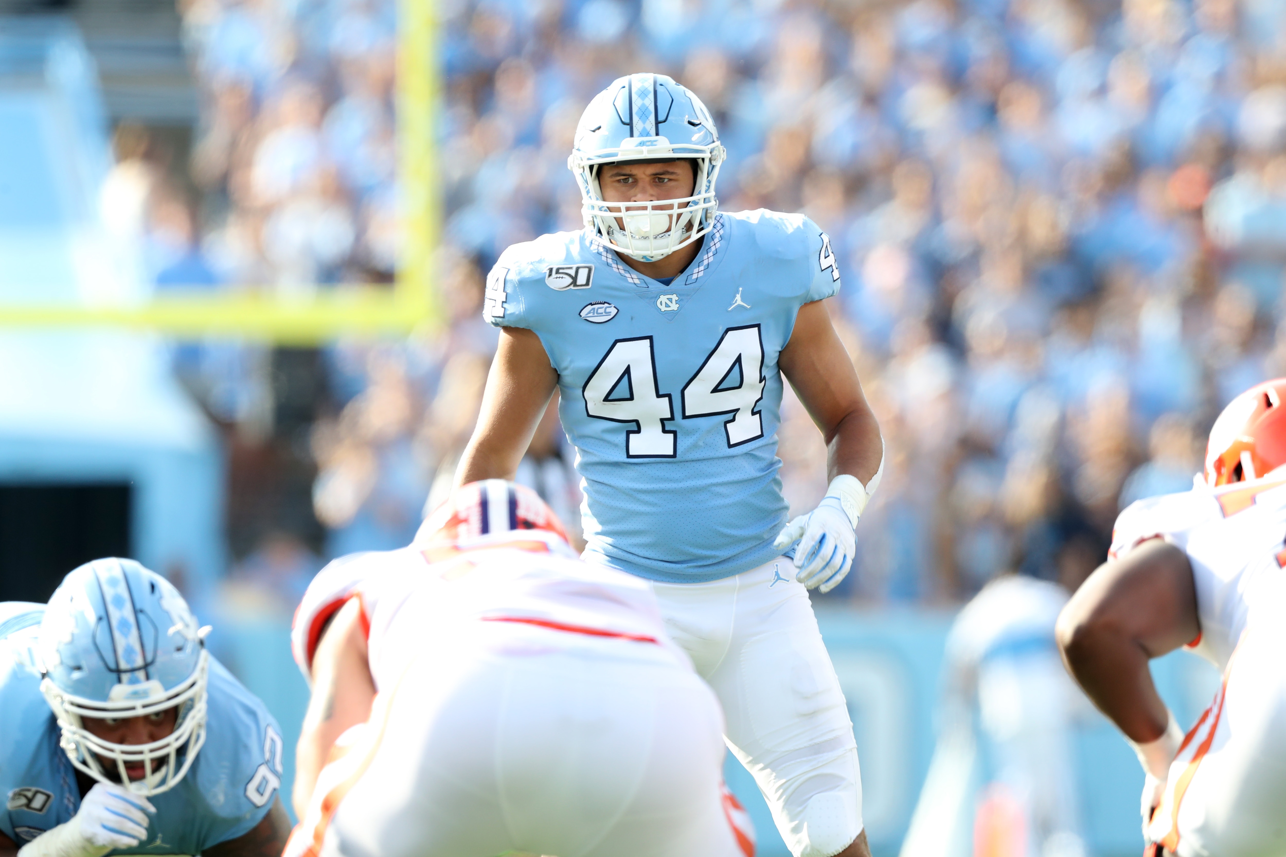 CHAPEL HILL, NC - SEPTEMBER 28: Jeremiah Gemmel #44 of the University of North Carolina looks over the line of scrimmage during a game between Clemson University and University of North Carolina at Kenan Memorial Stadium on September 28, 2019 in Chapel Hill, North Carolina. (Photo by Andy Mead/ISI Photos/Getty Images)