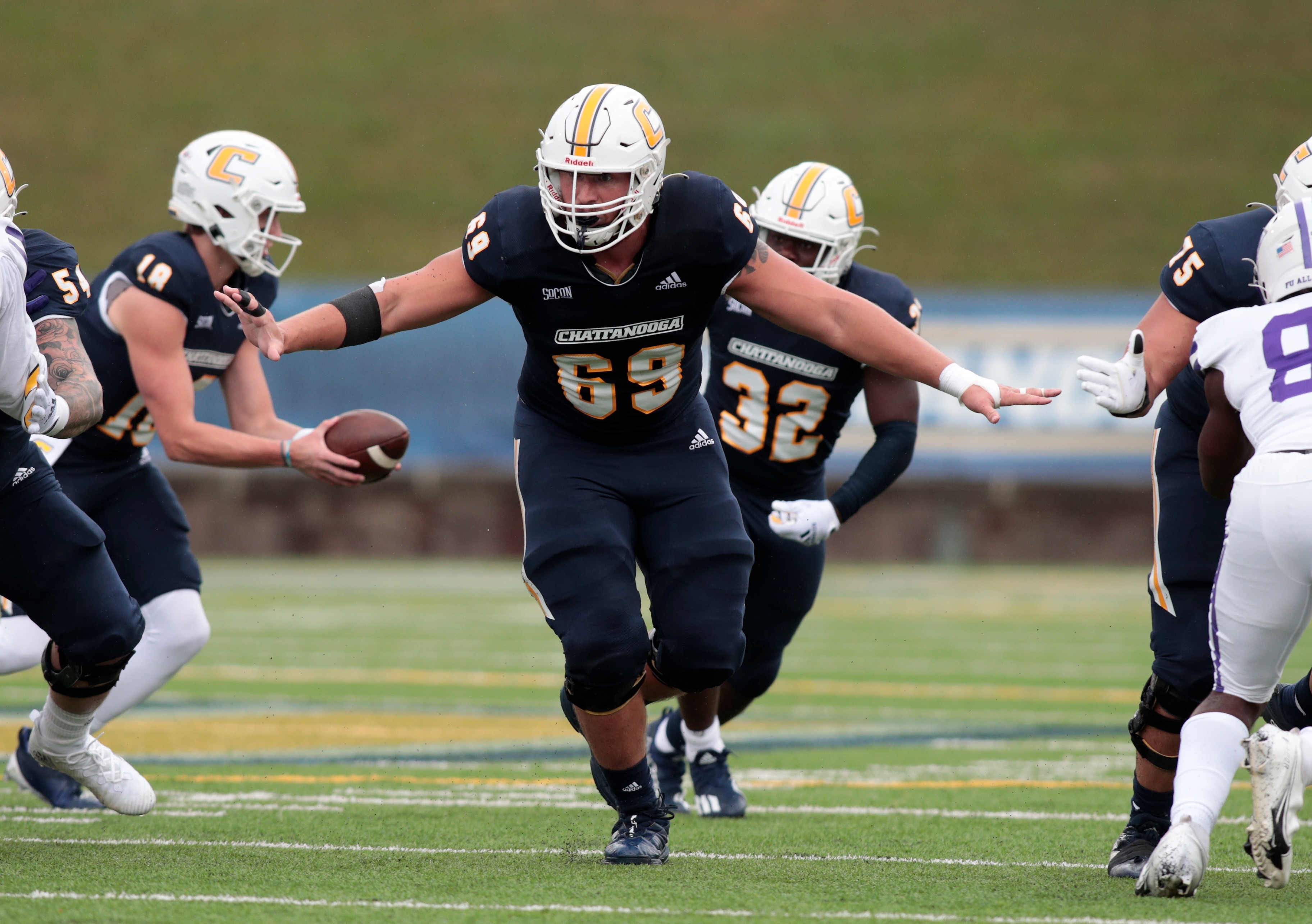 CHATTANOOGA, TN - OCTOBER 30: Chattanooga Mocs offensive lineman Cole Strange (69) blocking during the game between the Chattanooga Mocs and the Furman Paladins on October 30, 2021 at Finley stadium in Chattanooga, Tennessee. (Photo by Charles Mitchell/Icon Sportswire via Getty Images)