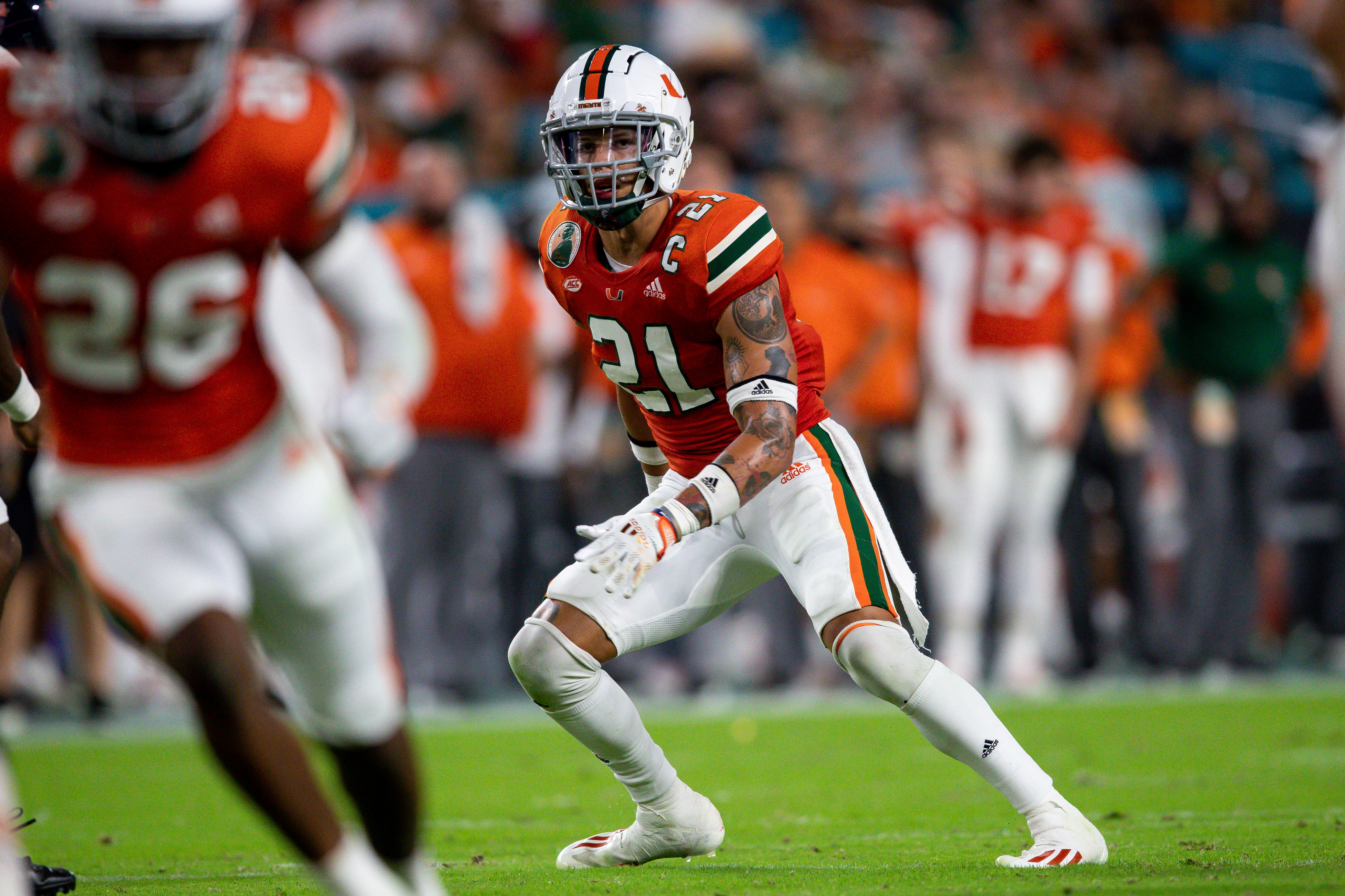 MIAMI GARDENS, FL - SEPTEMBER 30:  Miami Hurricanes safety Bubba Bolden (21) defends in coverage on defense during a college football game against the Virginia Cavaliers on September 30, 2021 at Hard Rock Stadium in Miami Gardens, FL. (Photo by Brandon Sloter/Icon Sportswire via Getty Images)