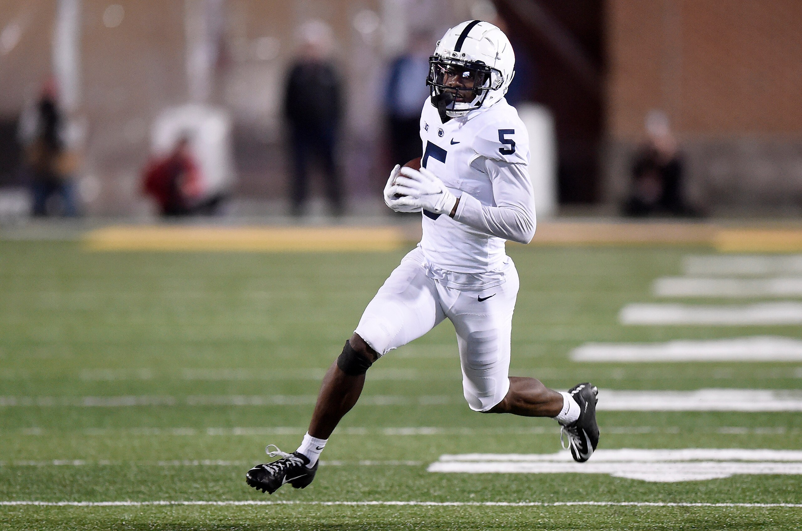 COLLEGE PARK, MARYLAND - NOVEMBER 06: Jahan Dotson #5 of the Penn State Nittany Lions runs with the ball after making a catch against the Maryland Terrapins at Capital One Field at Maryland Stadium on November 06, 2021 in College Park, Maryland. (Photo by G Fiume/Getty Images) COLLEGE PARK, MARYLAND - NOVEMBER 06: Jahan Dotson #5 of the Penn State Nittany Lions runs with the ball after making a catch against the Maryland Terrapins at Capital One Field at Maryland Stadium on November 06, 2021 in College Park, Maryland. (Photo by G Fiume/Getty Images)