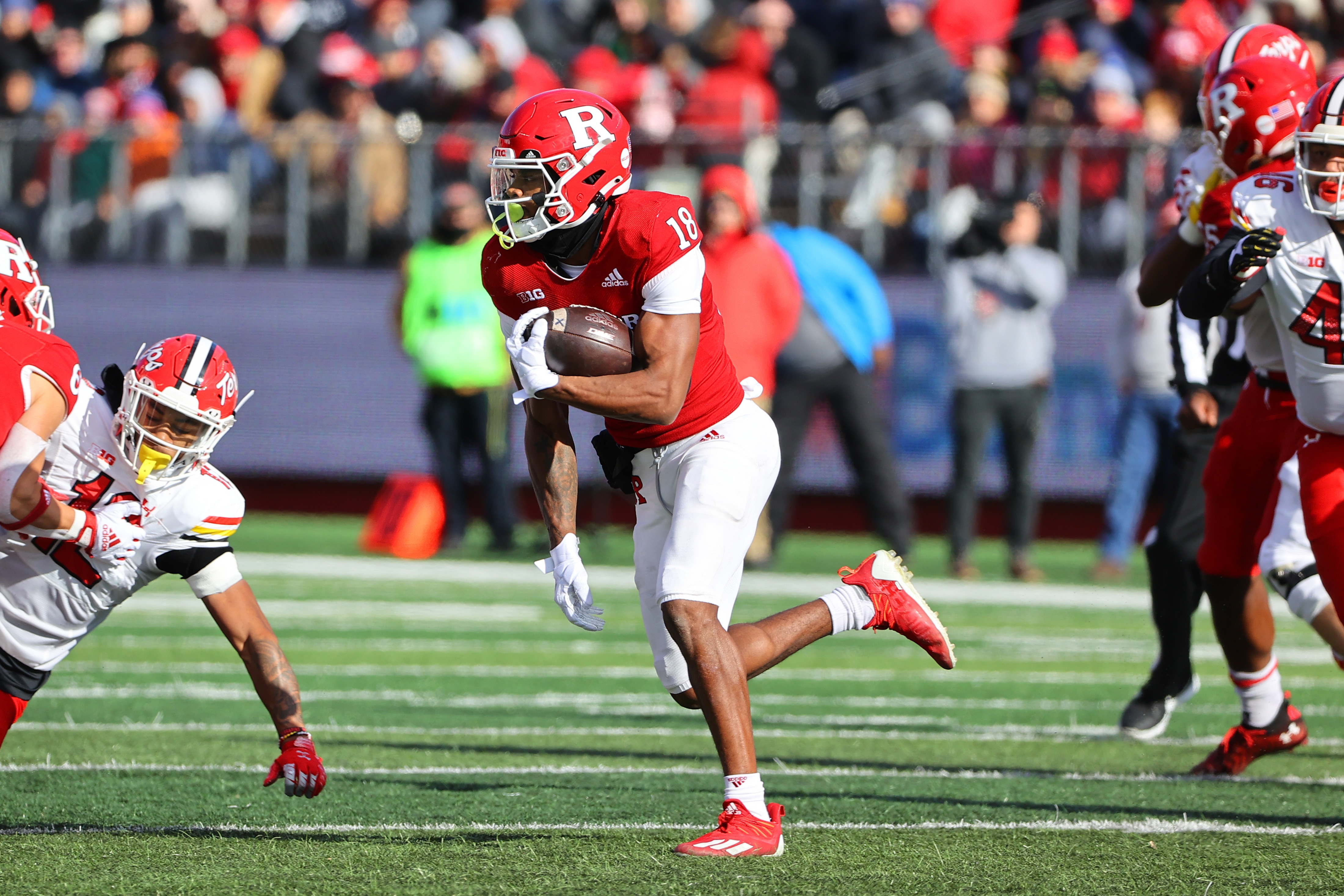 PISCATAWAY, NJ - NOVEMBER 27:  Rutgers Scarlet Knights wide receiver Bo Melton (18) runs during the college football game between the Rutgers Scarlet Knights and the Maryland Terrapins on November 27, 2021 at SHI Stadium in Piscataway, NJ.   (Photo by Rich Graessle/Icon Sportswire via Getty Images)