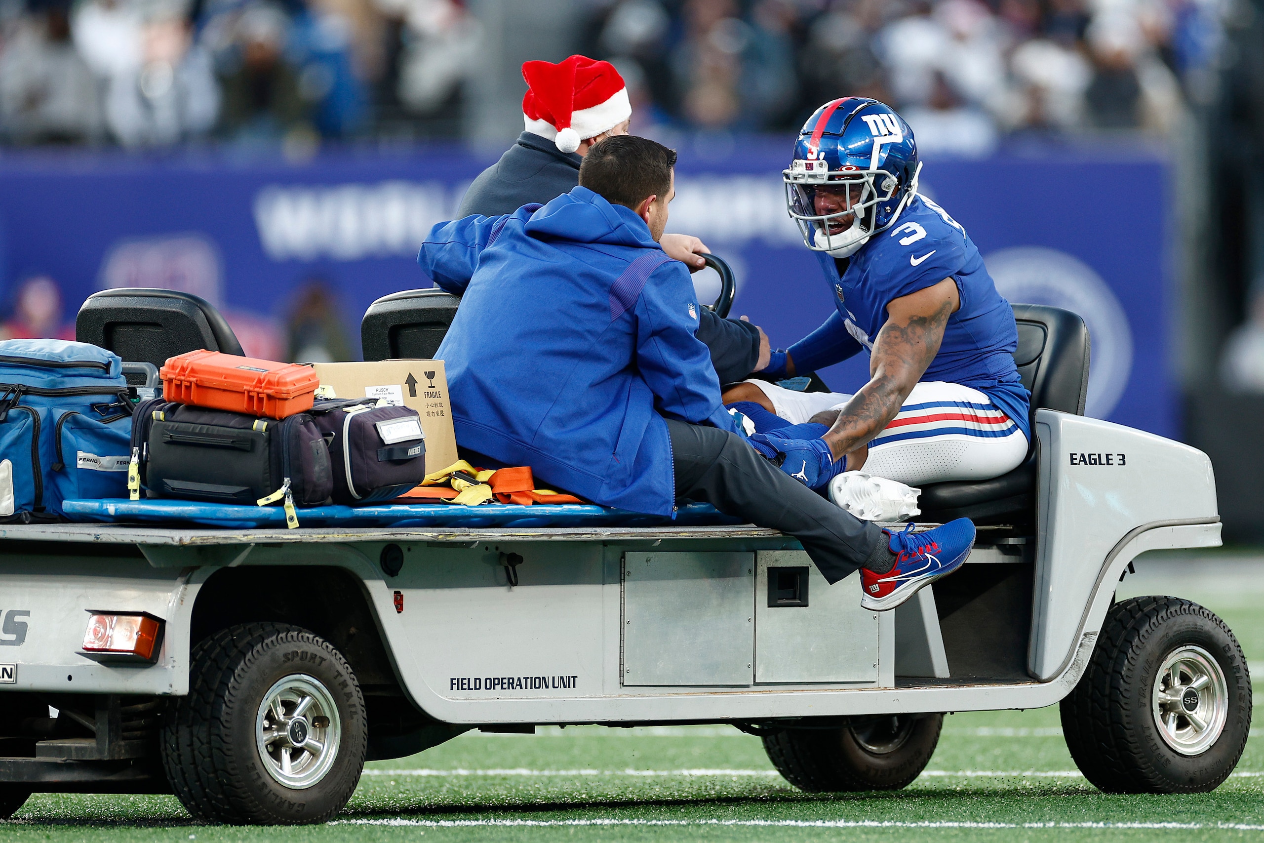 EAST RUTHERFORD, NEW JERSEY - DECEMBER 19: Sterling Shepard #3 of the New York Giants is taken off the field on a cart during the fourth quarter against the Dallas Cowboys at MetLife Stadium on December 19, 2021 in East Rutherford, New Jersey. (Photo by Sarah Stier/Getty Images)