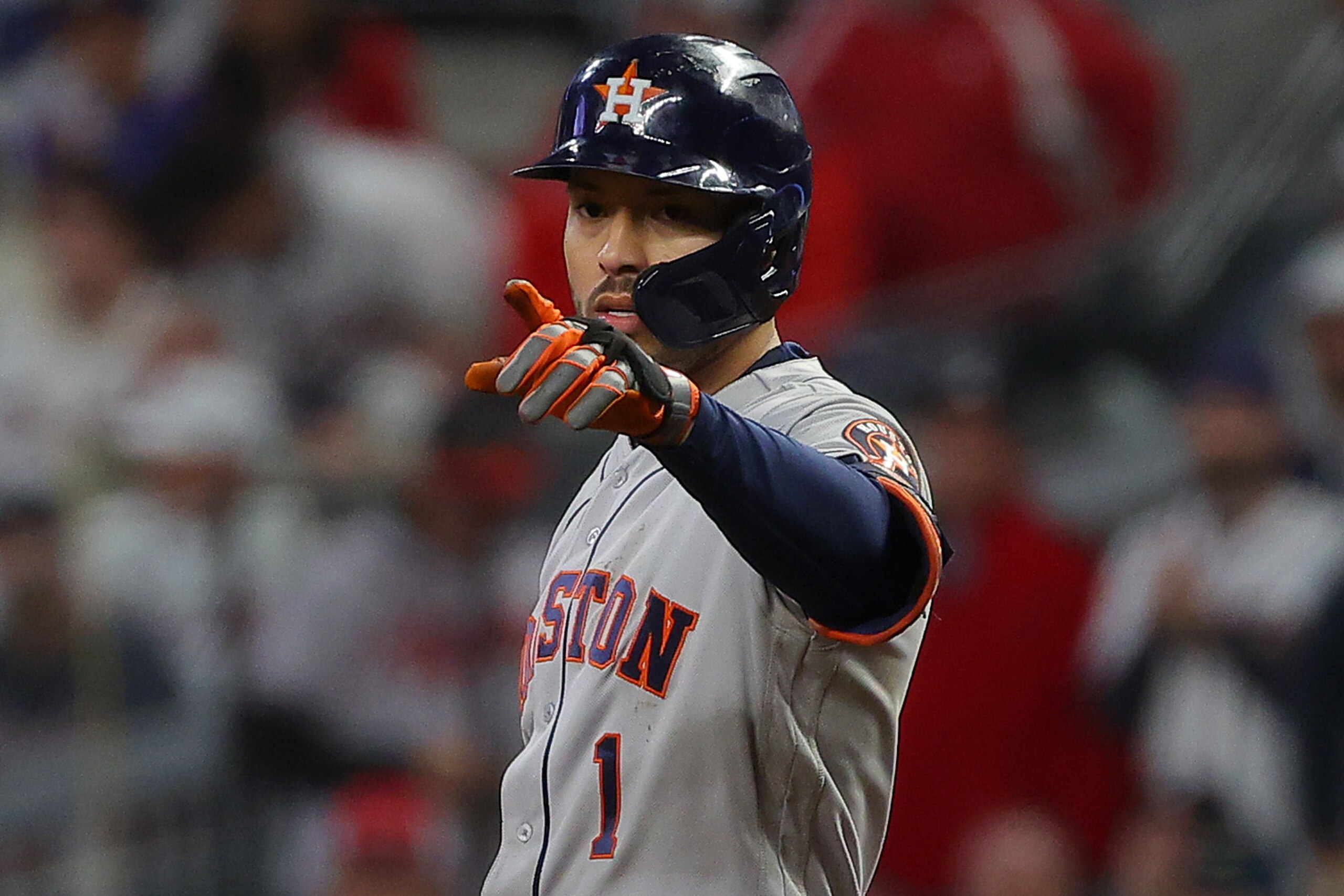ATLANTA, GEORGIA - OCTOBER 31:  Carlos Correa #1 of the Houston Astros reacts after hitting a single against the Atlanta Braves during the fifth inning in Game Five of the World Series at Truist Park on October 31, 2021 in Atlanta, Georgia. (Photo by Kevin C. Cox/Getty Images)