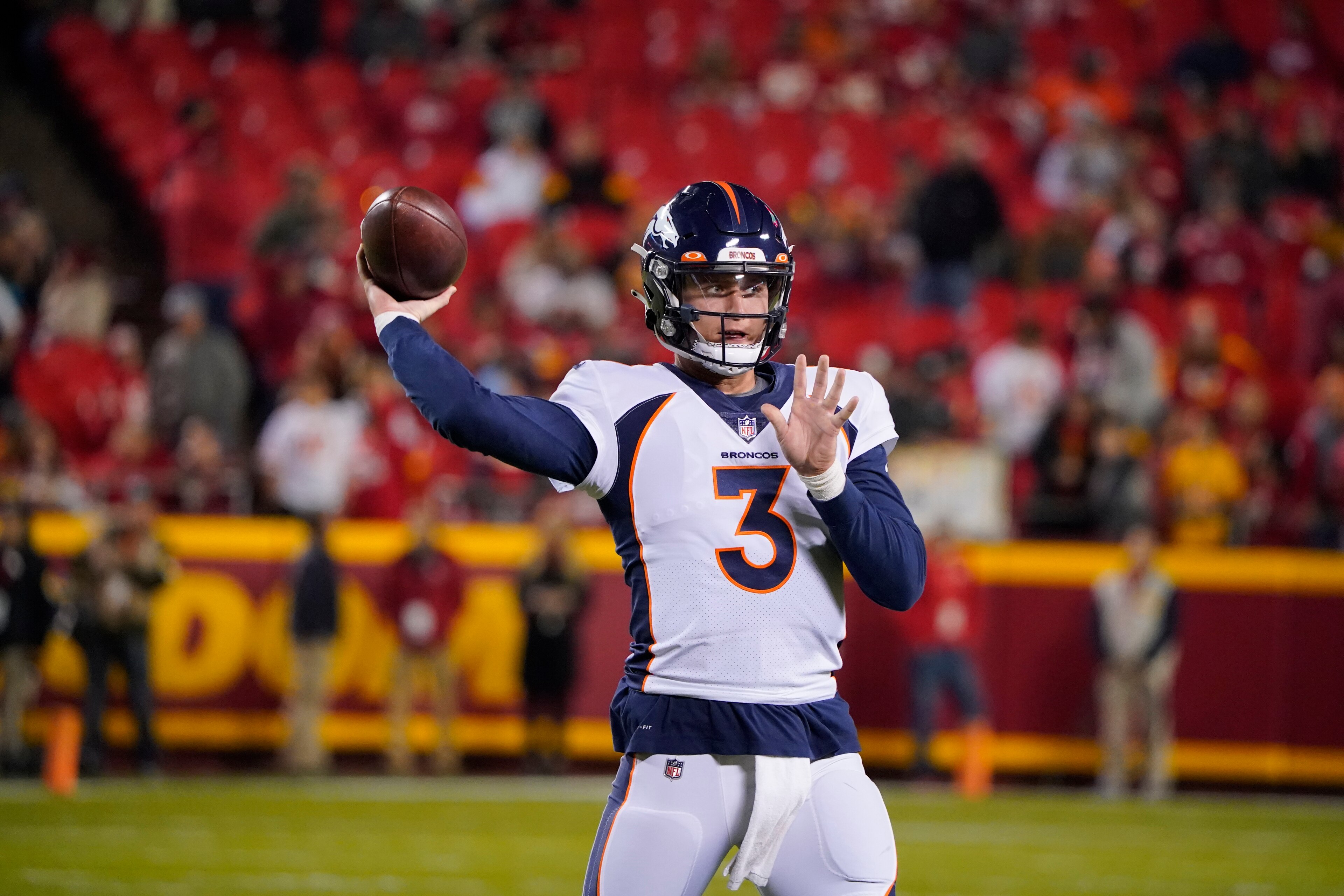 Denver Broncos quarterback Drew Lock warms up before the start of an NFL football game between the Denver Broncos and Kansas City Chiefs Sunday, Dec. 5, 2021, in Kansas City, Mo. (AP Photo/Ed Zurga)