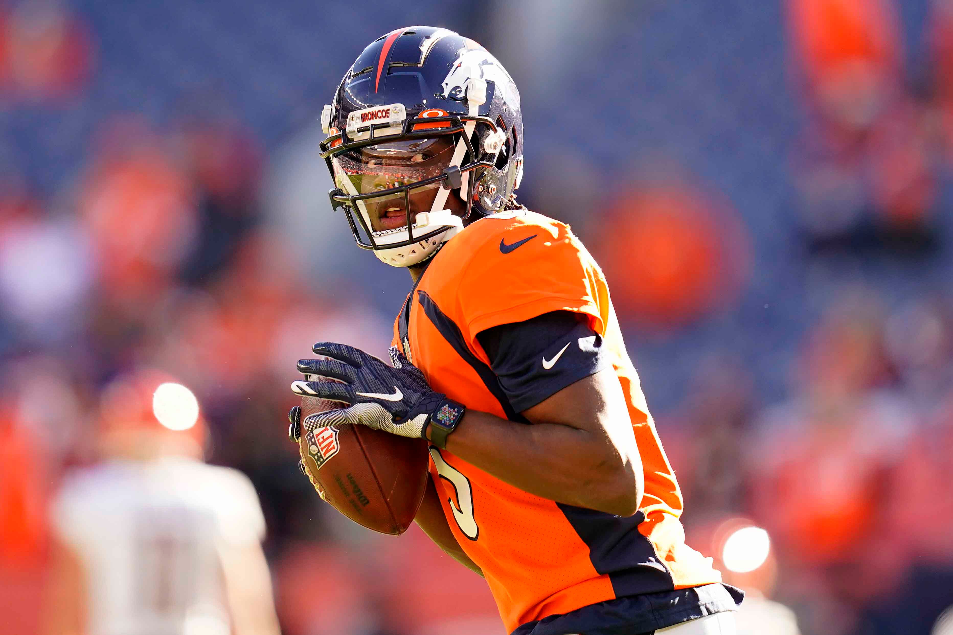 Denver Broncos quarterback Teddy Bridgewater (5) warms up prior to an NFL football game against the Cincinnati Bengals, Sunday, Dec. 19, 2021, in Denver. (AP Photo/Jack Dempsey)