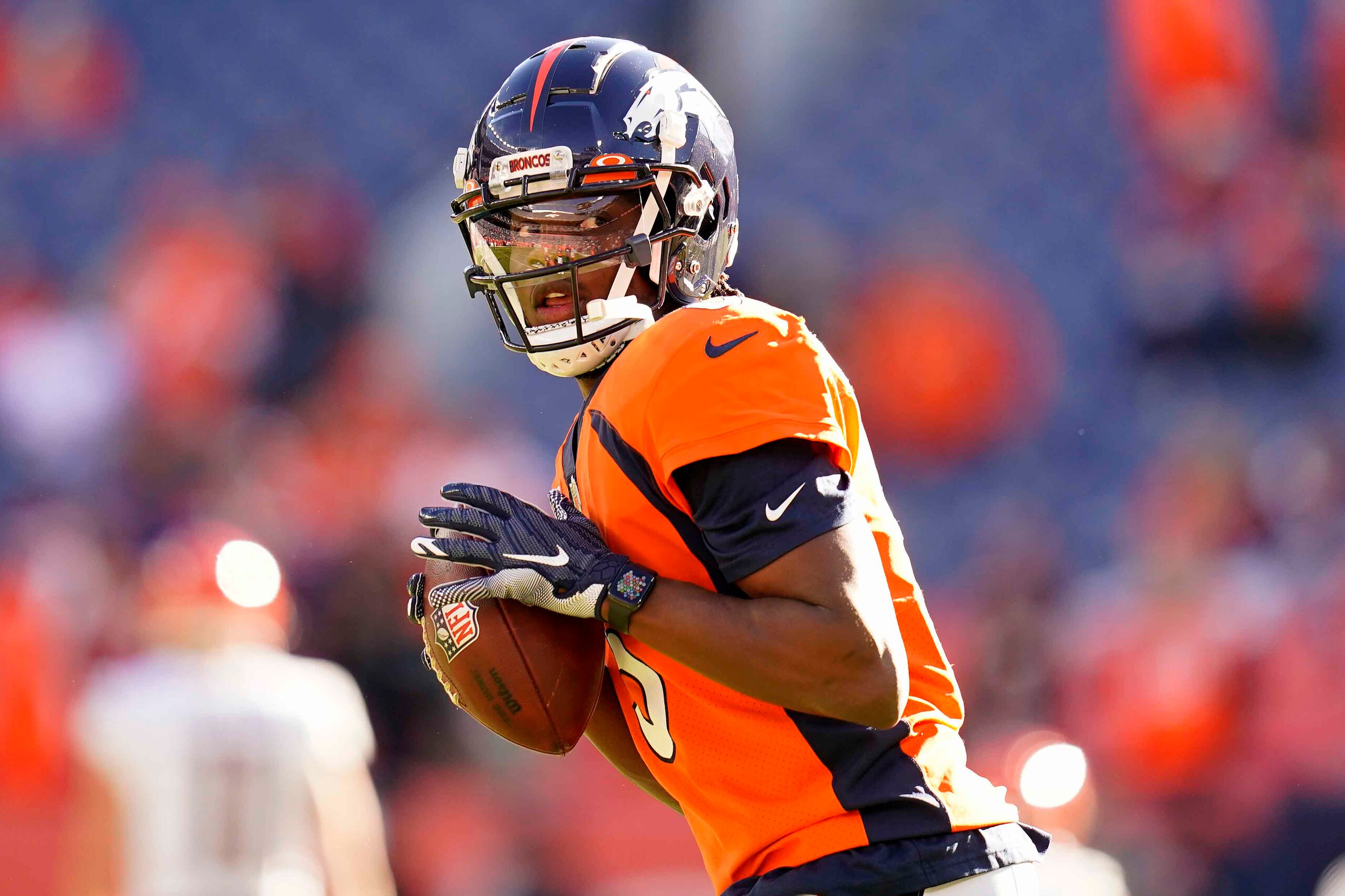 Denver Broncos quarterback Teddy Bridgewater (5) warms up prior to an NFL football game against the Cincinnati Bengals, Sunday, Dec. 19, 2021, in Denver. (AP Photo/Jack Dempsey)