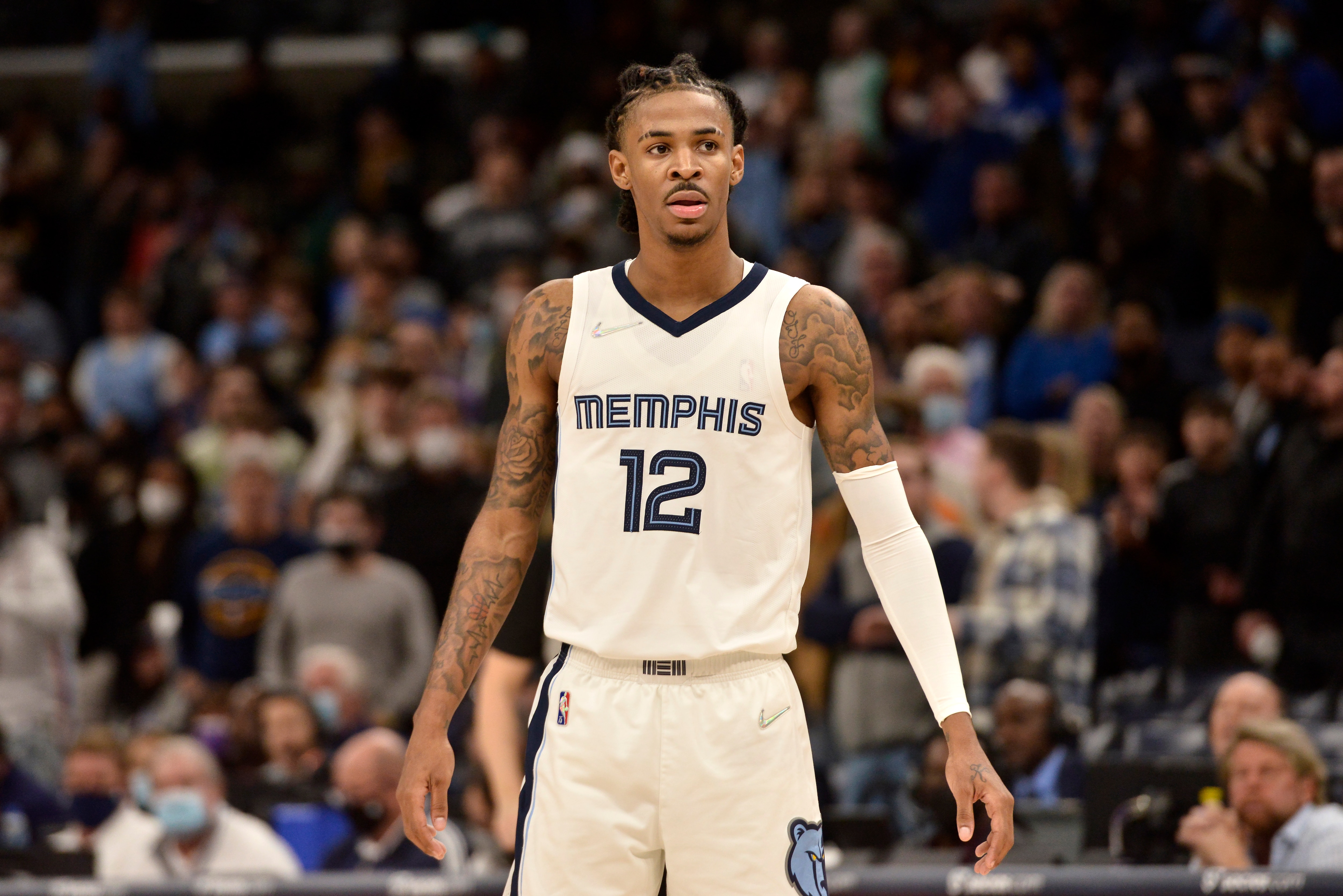 Memphis Grizzlies guard Ja Morant (12) plays in the second half of an NBA basketball game against the Oklahoma City Thunder Monday, Dec. 20, 2021, in Memphis, Tenn. (AP Photo/Brandon Dill)